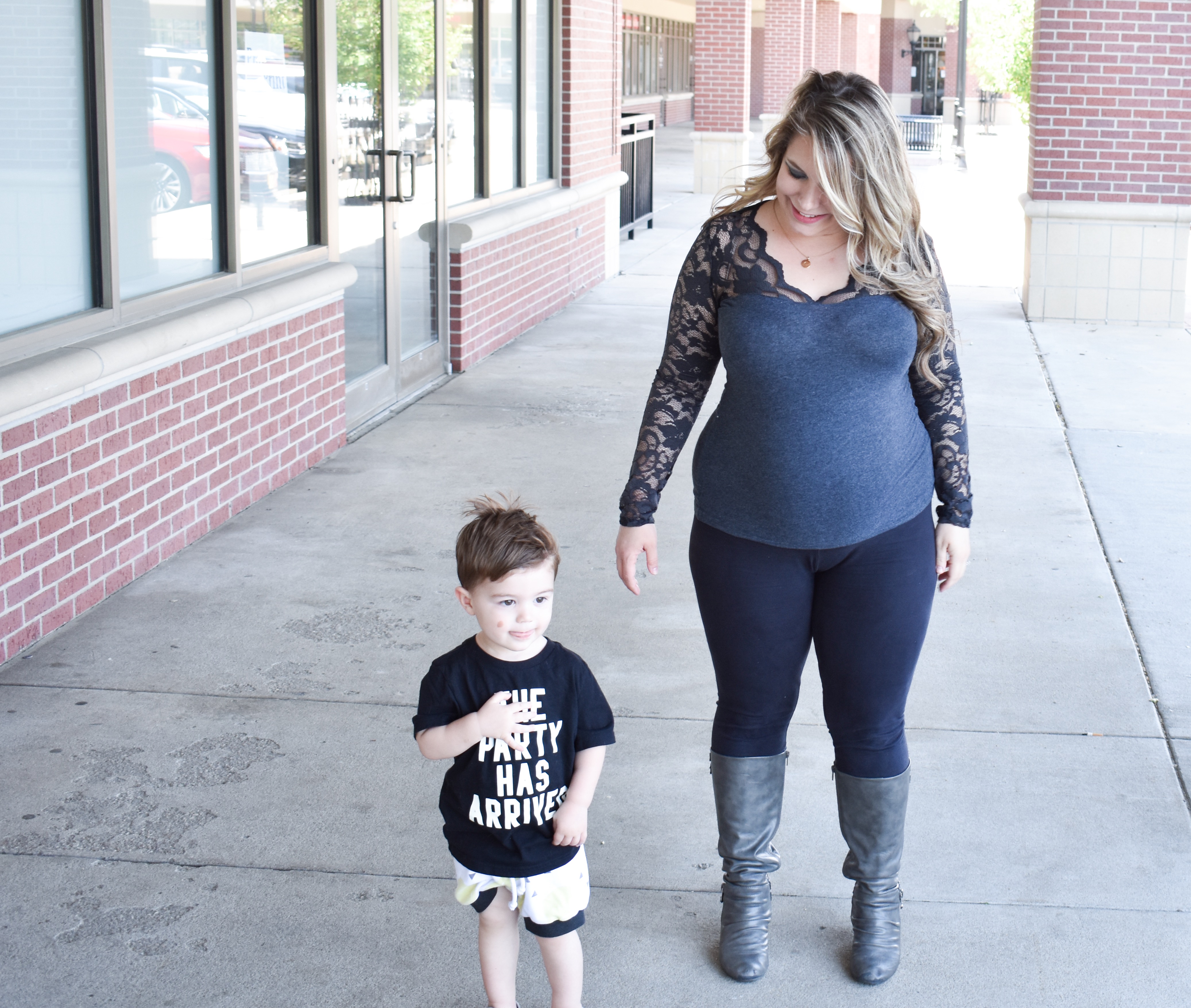 Pregnant Mom and Son Walking