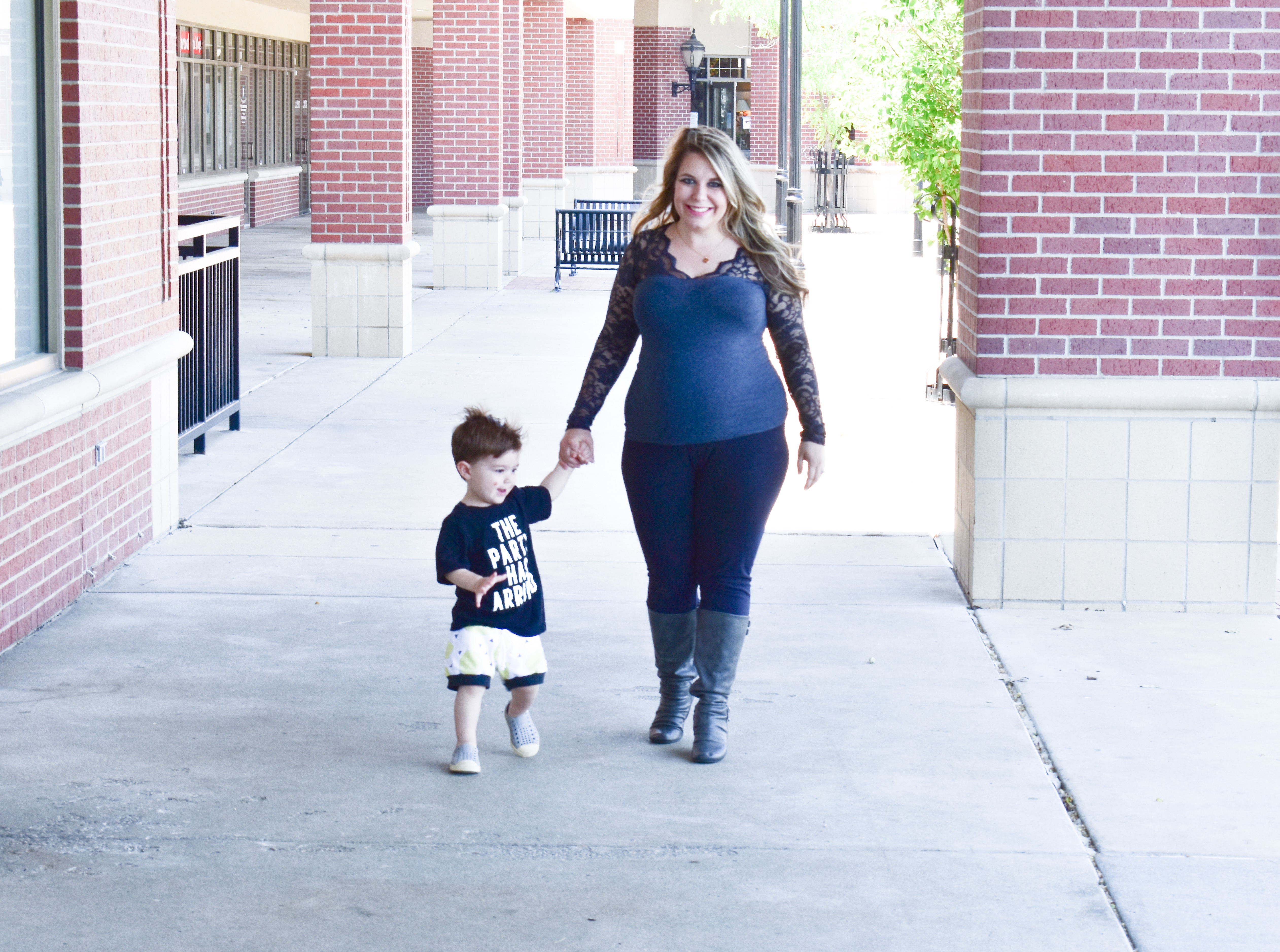 Pregnant Mom and Son Walking