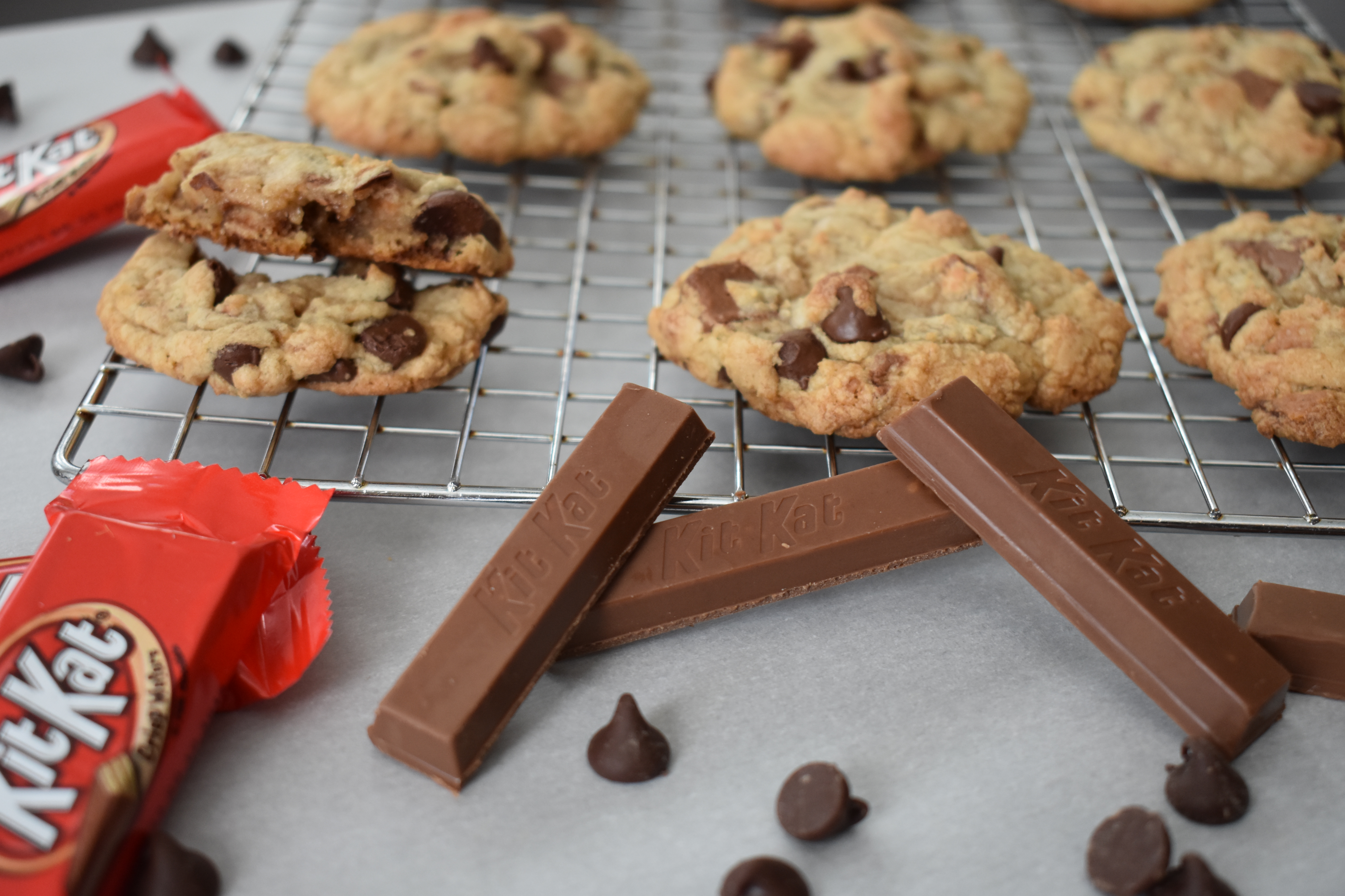 This delicious KitKat Cookie Recipe is the perfect way to use leftover Halloween candy! These KitKat cookies also make a great holiday party dessert or a treat any time of the year. They're soft, chewy, and soooo tasty. If you're looking for a soft-baked chocolate chip cookie recipe with a little something extra, this is it! Trust me, Kit Kat isn't just for Halloween anymore!