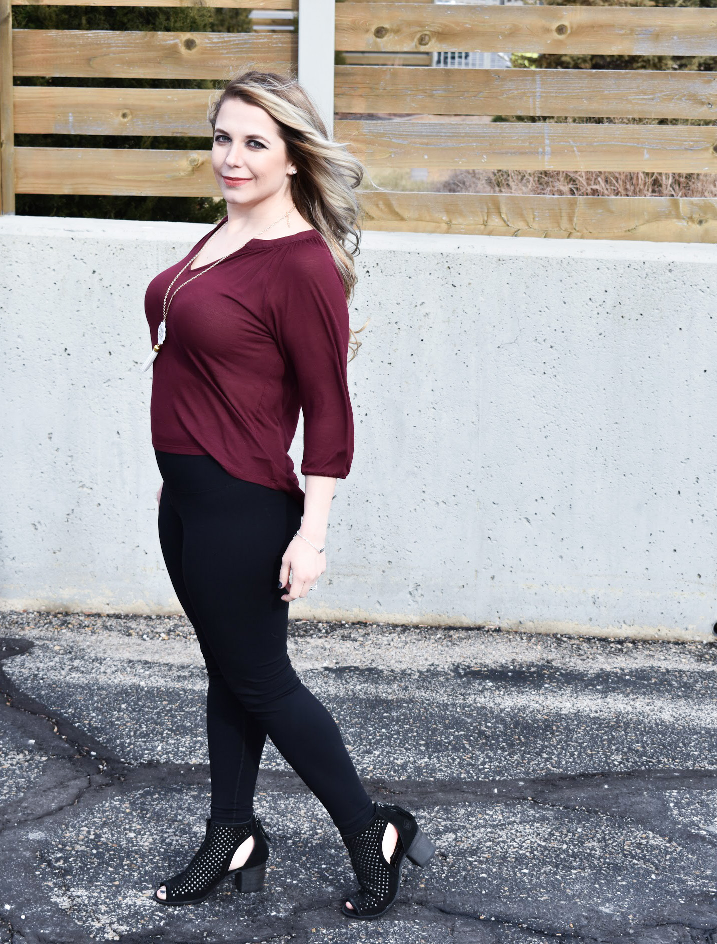 Dress Up Leggings with Ankle Boots. One of my favorite outfit ideas for leggings is to dress the leggings up with some stylish ankle boots! Take leggings from day to night with this easy styling trick! Here, I styled black leggings with black ankle boots for a sleek monochromatic look.