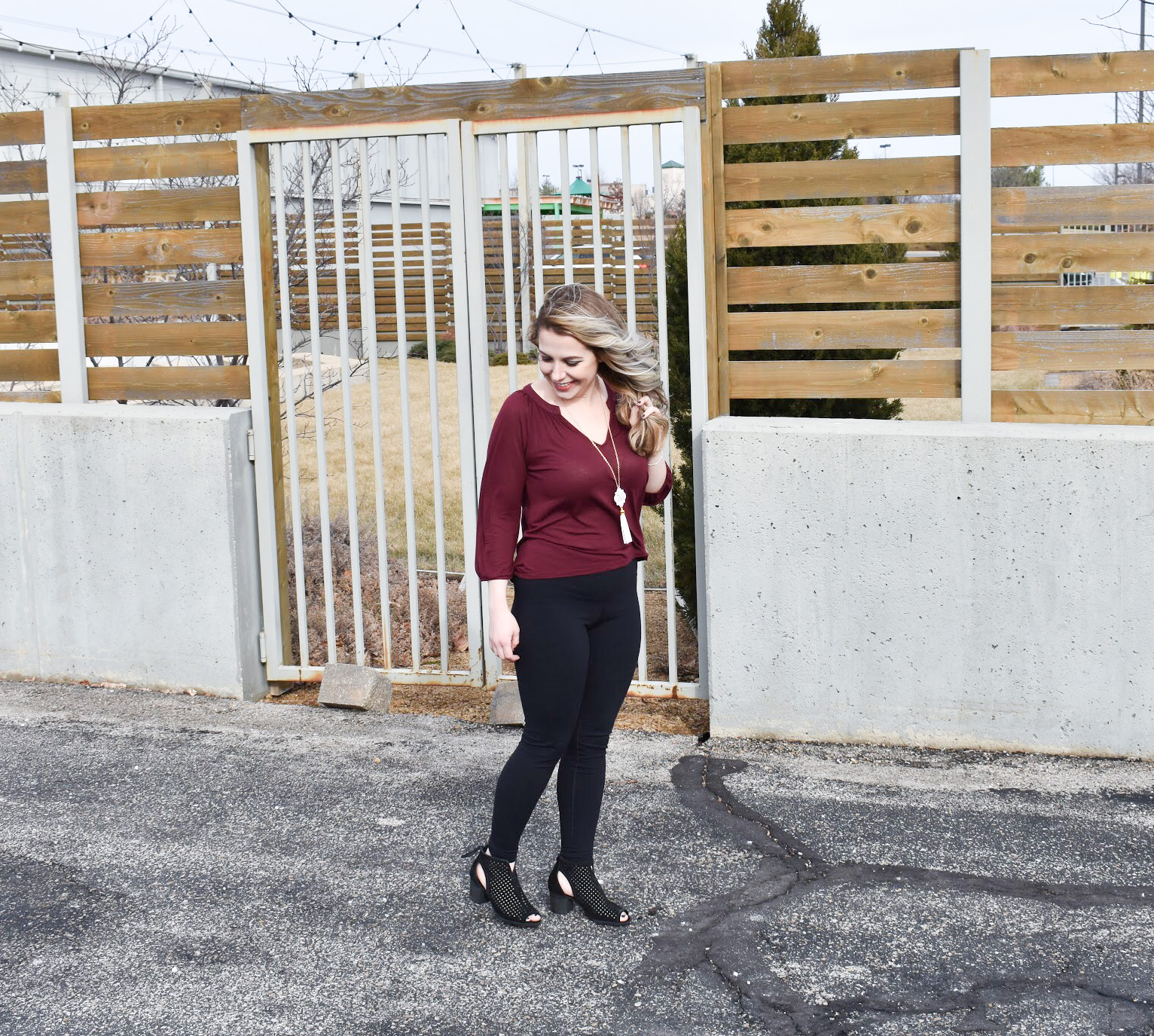 Dress Up Leggings with Ankle Boots. One of my favorite outfit ideas for leggings is to dress the leggings up with some stylish ankle boots! Take leggings from day to night with this easy styling trick! Here, I styled black leggings with black ankle boots for a sleek monochromatic look.