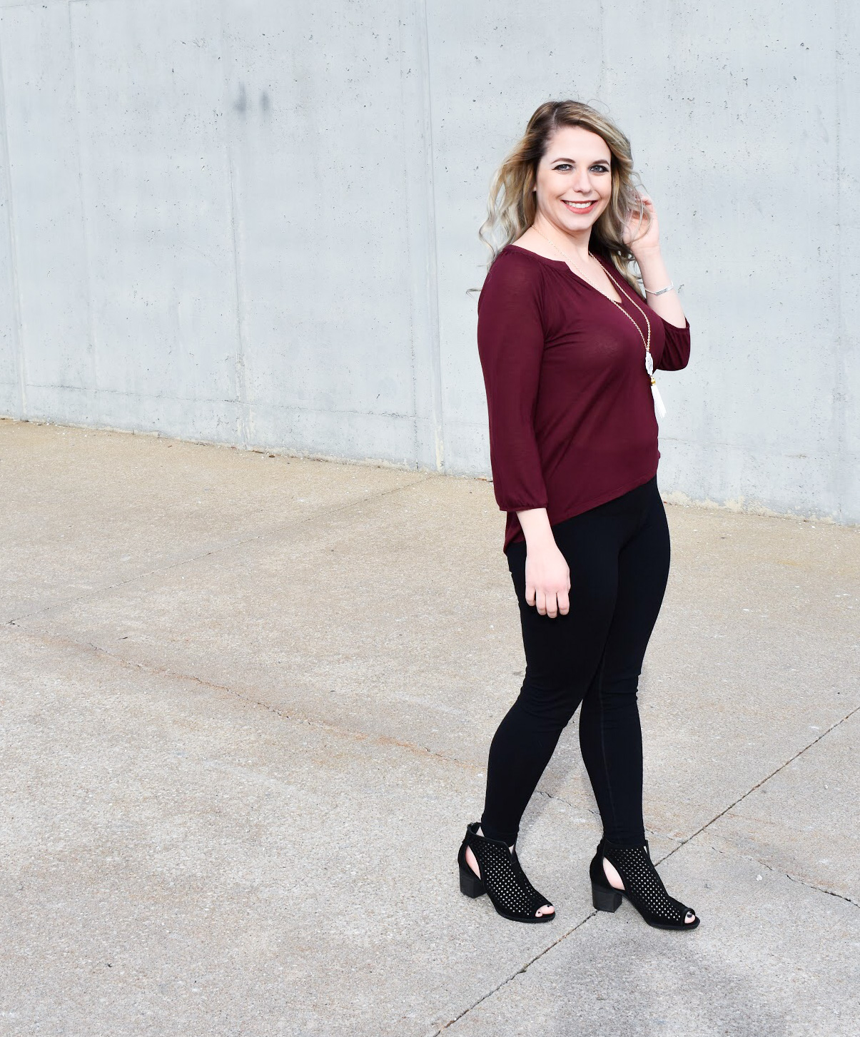 Dress Up Leggings with Ankle Boots. One of my favorite outfit ideas for leggings is to dress the leggings up with some stylish ankle boots! Take leggings from day to night with this easy styling trick! Here, I styled black leggings with black ankle boots for a sleek monochromatic look.