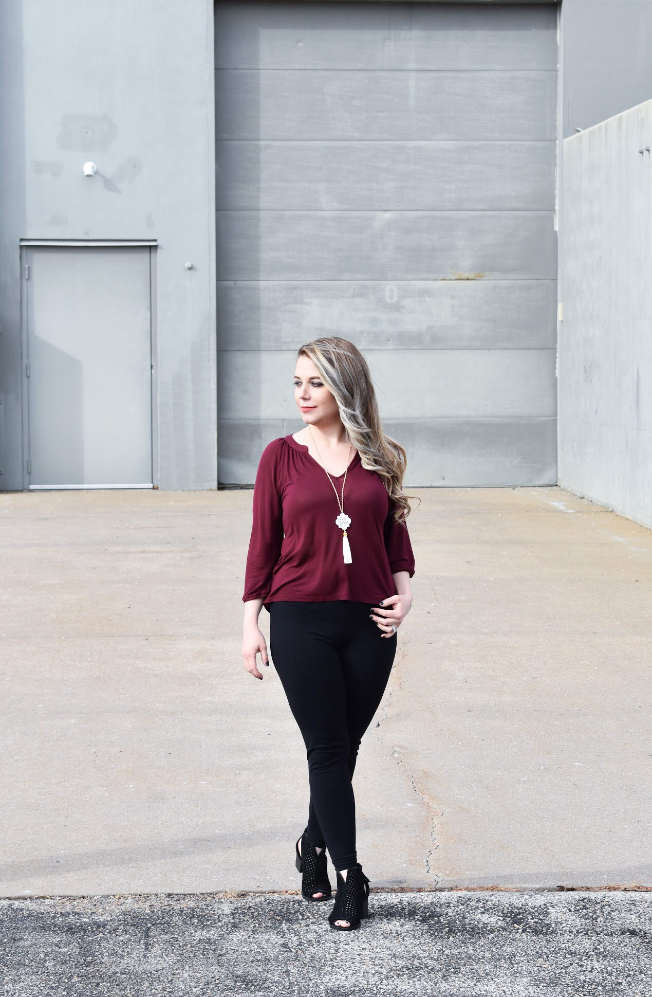 Dress Up Leggings with Ankle Boots. One of my favorite outfit ideas for leggings is to dress the leggings up with some stylish ankle boots! Take leggings from day to night with this easy styling trick! Here, I styled black leggings with black ankle boots for a sleek monochromatic look.