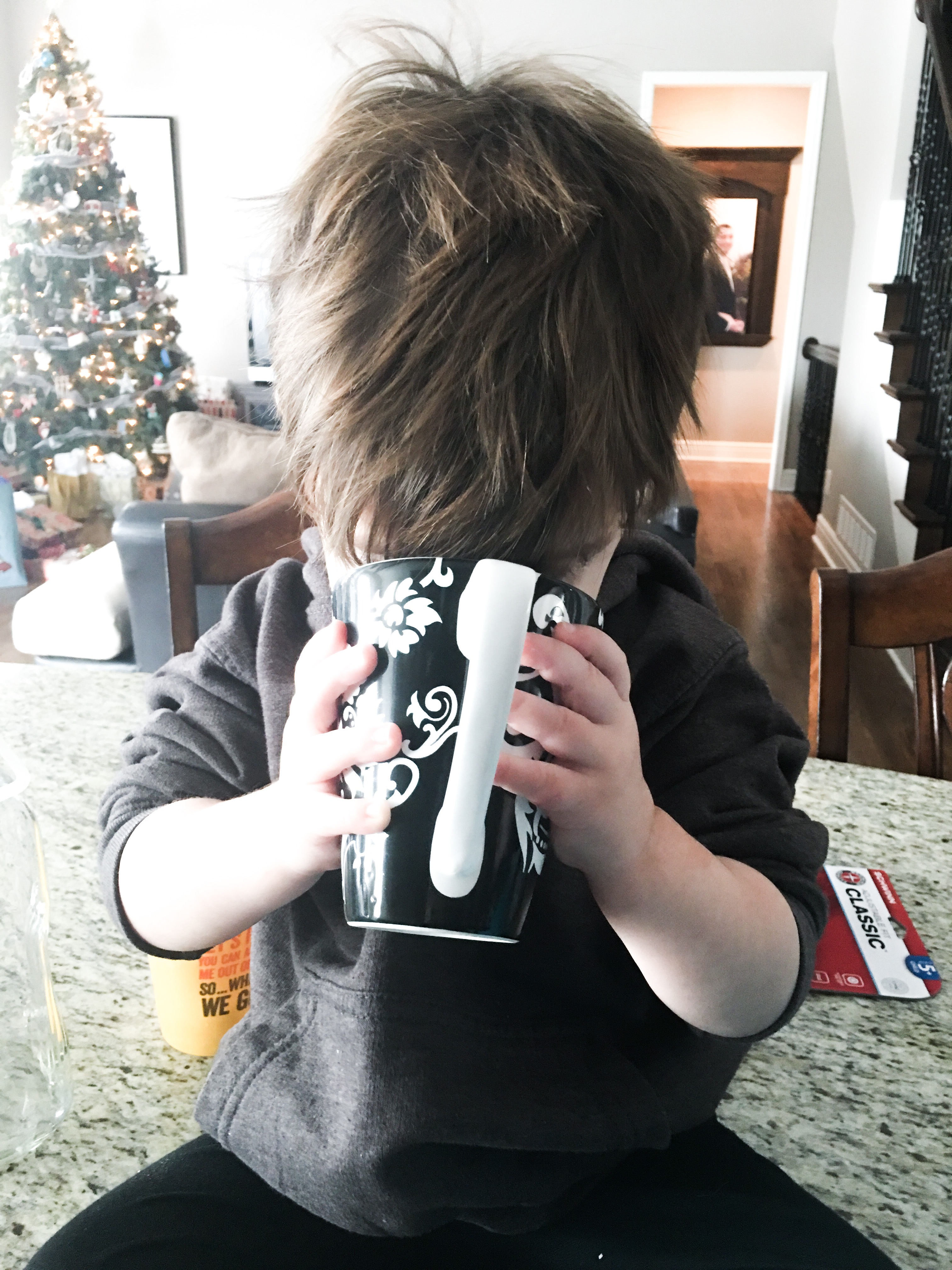 Toddler Boy Drinking Hot Chocolate