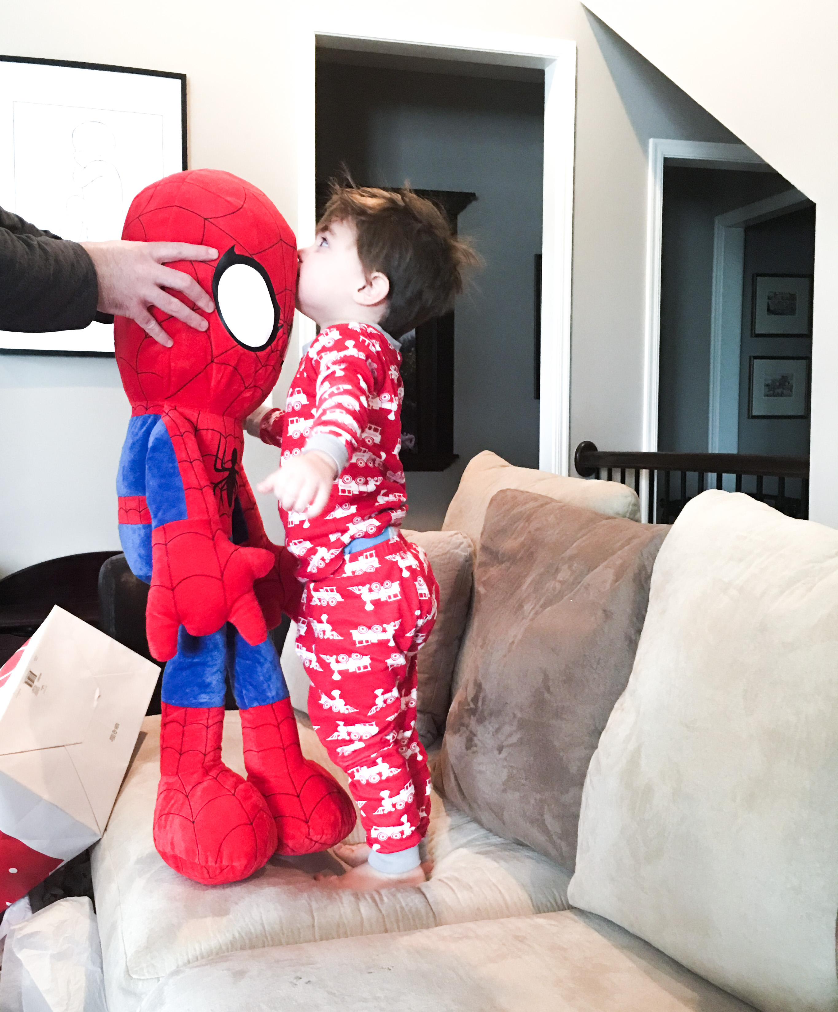 Boy with Lifesize Spiderman Plush