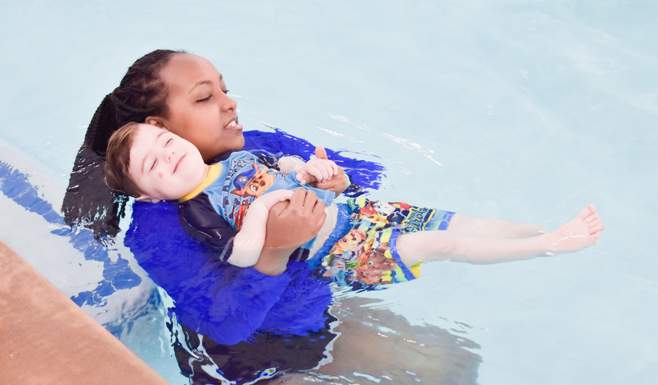 What to Expect at Baby Swim Lessons: Prepare yourself and your child for their first swim lesson with these tips! My infant and preschooler take lessons at Aqua-Tots Swim School in Olathe, KS. Here's what I learned from the pros about baby swim lessons and getting kids acclimated to the water!