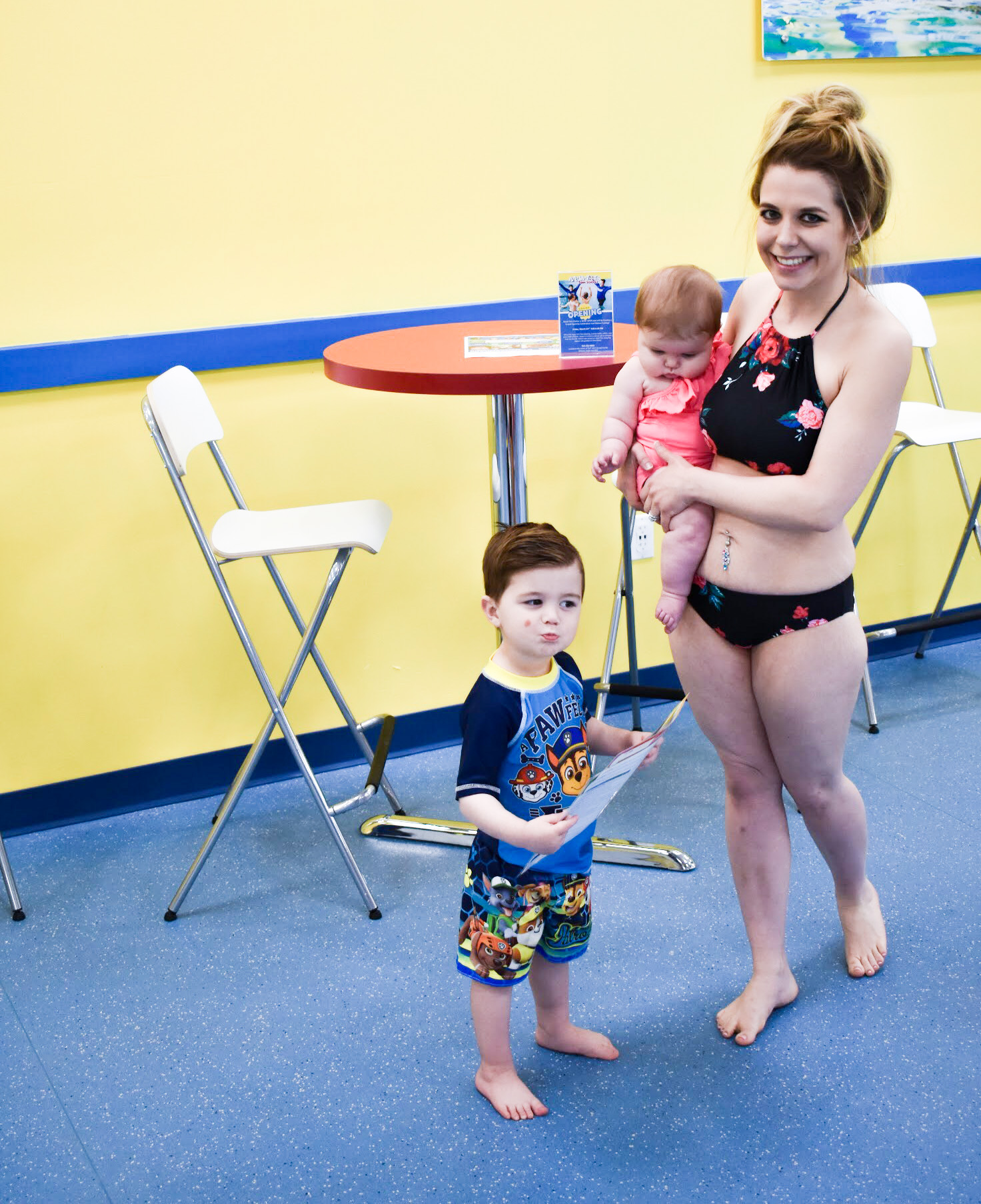 What to Expect at Baby Swim Lessons: Prepare yourself and your child for their first swim lesson with these tips! My infant and preschooler take lessons at Aqua-Tots Swim School in Olathe, KS. Here's what I learned from the pros about baby swim lessons and getting kids acclimated to the water!