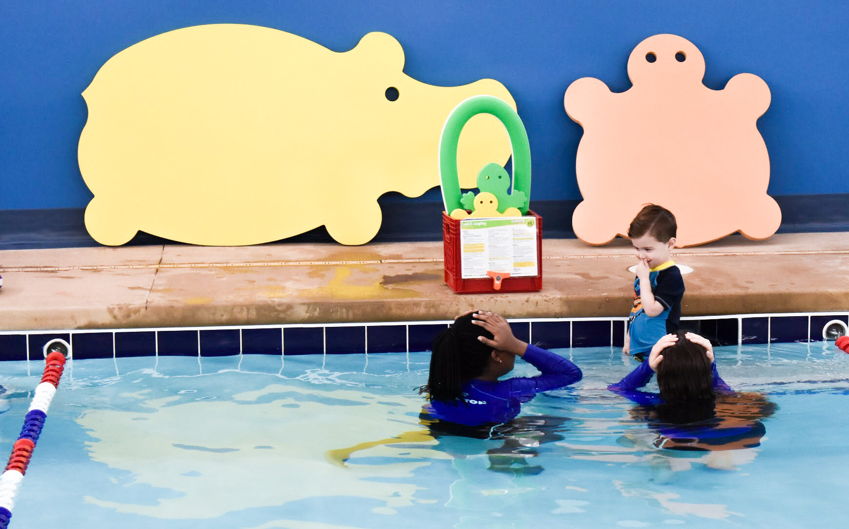 What to Expect at Baby Swim Lessons: Prepare yourself and your child for their first swim lesson with these tips! My infant and preschooler take lessons at Aqua-Tots Swim School in Olathe, KS. Here's what I learned from the pros about baby swim lessons and getting kids acclimated to the water!