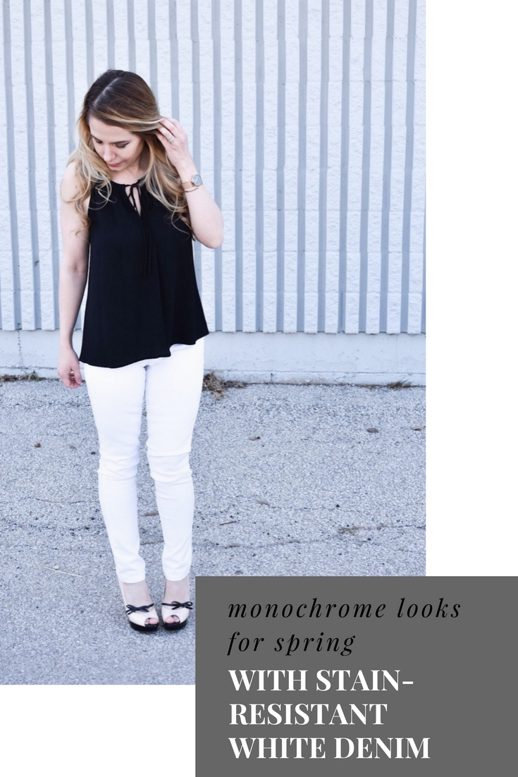 Monochrome Looks for Spring: Some people think you can't wear black and white in the spring. Those people are wrong. Fashion blogger COVET by tricia showcases a springtime monochrome look featuring Banana Republic Stay White Denim and a Tyche black halter top. Minimalist jewelry completes the look. Monochrome is trending for spring 2018, so here's how to effortlessly incorporate it into your wardrobe.