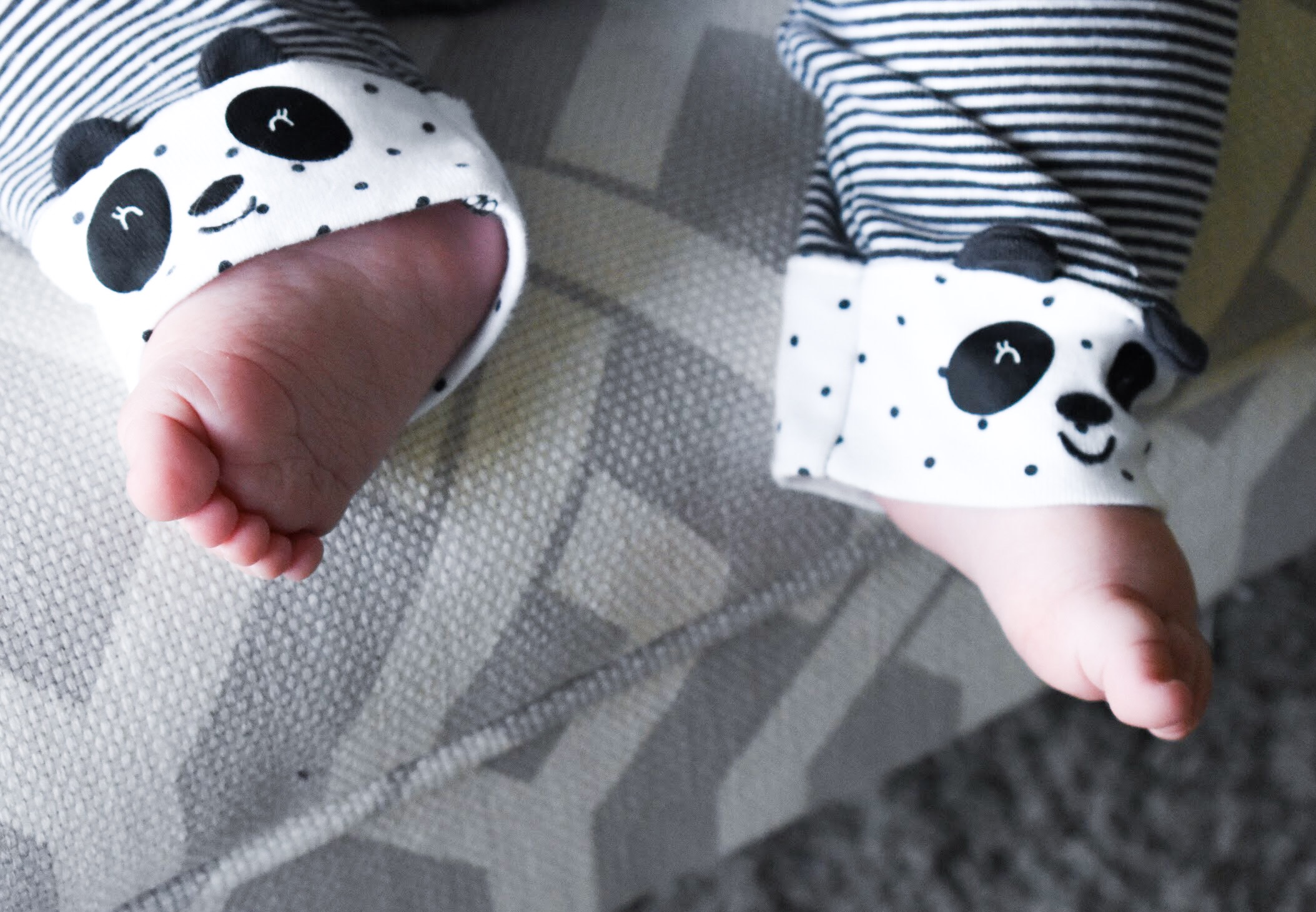 Baby Girl Summer Wardrobe - Building a Capsule Wardrobe for Baby. Here's how I built a capsule wardrobe for Baby Girl's summer clothes. A minimalist monochrome baby girl wardrobe in black, white and grey, with touches of baby pink. Simplify your mornings by getting Baby dressed faster and keep her looking stylish with this easy-to-follow advice.