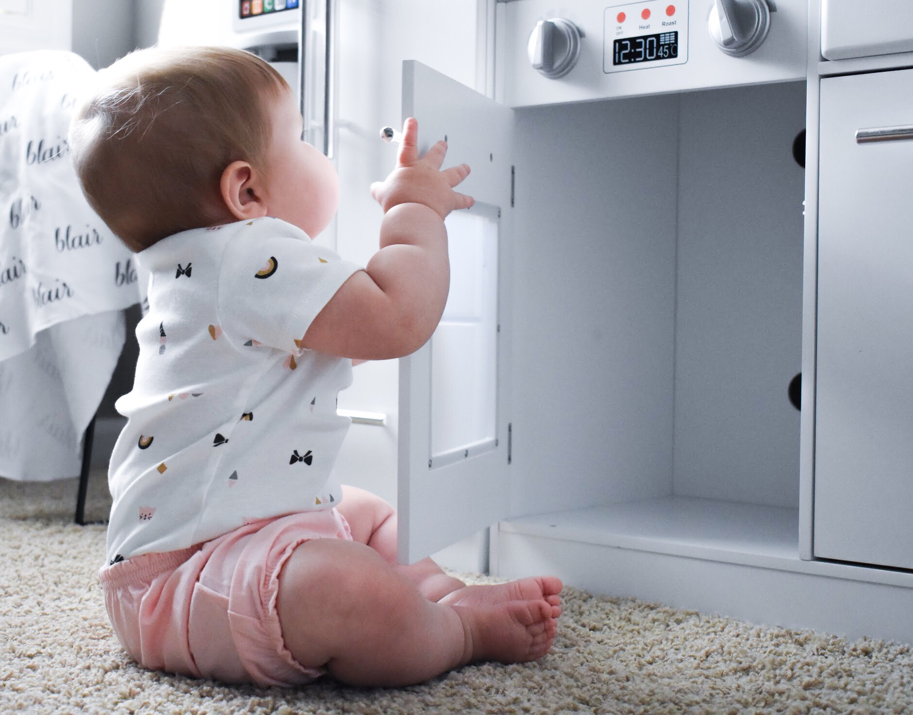 Baby Girl Summer Wardrobe - Building a Capsule Wardrobe for Baby. Here's how I built a capsule wardrobe for Baby Girl's summer clothes. A minimalist monochrome baby girl wardrobe in black, white and grey, with touches of baby pink. Simplify your mornings by getting Baby dressed faster and keep her looking stylish with this easy-to-follow advice.