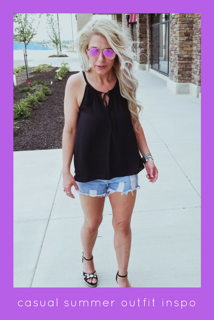 Casual Summer Outfit - Black Halter, Ripped Denim Shorts, and Black Wedges. Summer 2018 is in full swing and here's one of the hottest looks we've seen yet. Pair your ripped jean shorts with a black tank top for a casual summer outfit that's sure to impress. Don't forget the accessories, like the stylish Victoria Emerson bracelet featured here. Click for an exclusive Victoria Emerson coupon code!