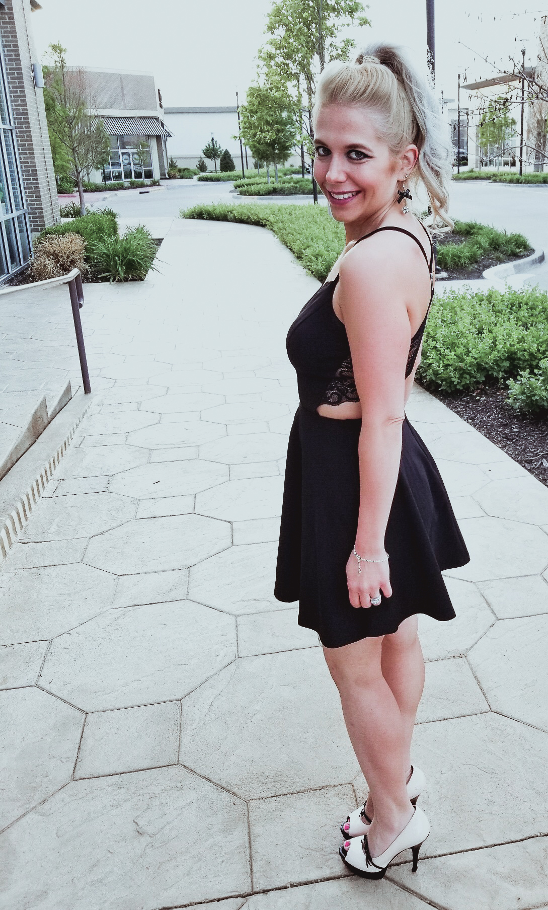 Perfect Affordable LBD for Summer 2018: This little black dress is stylish, flirty, and around $30! Fashion blogger COVET by tricia showcases this unique black lace back dress with platform heels to create a stunning summer 2018 fashion look. You'll definitely want to show off the zipper and lace back on this affordable LBD!