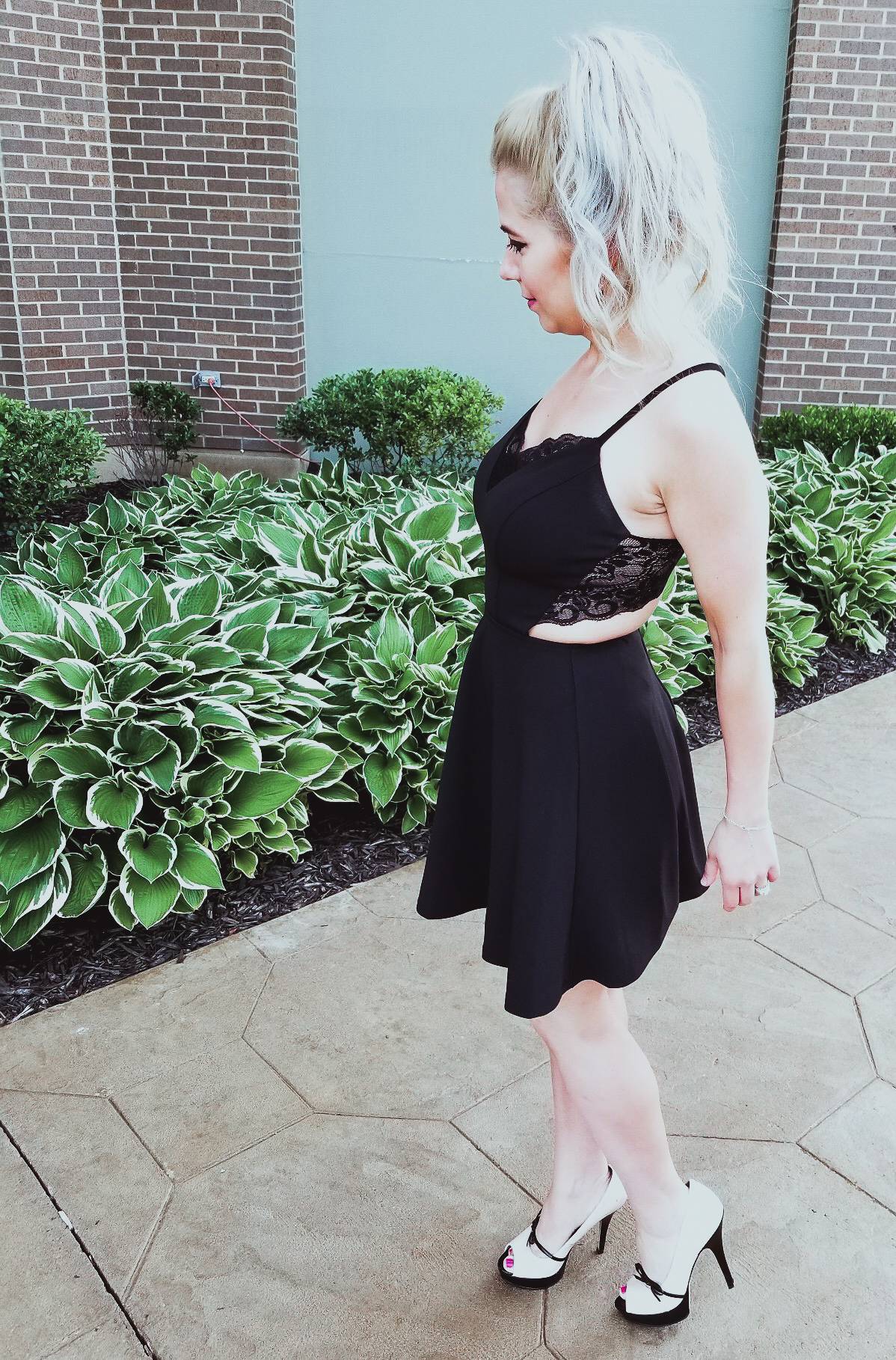 Perfect Affordable LBD for Summer 2018: This little black dress is stylish, flirty, and around $30! Fashion blogger COVET by tricia showcases this unique black lace back dress with platform heels to create a stunning summer 2018 fashion look. You'll definitely want to show off the zipper and lace back on this affordable LBD!