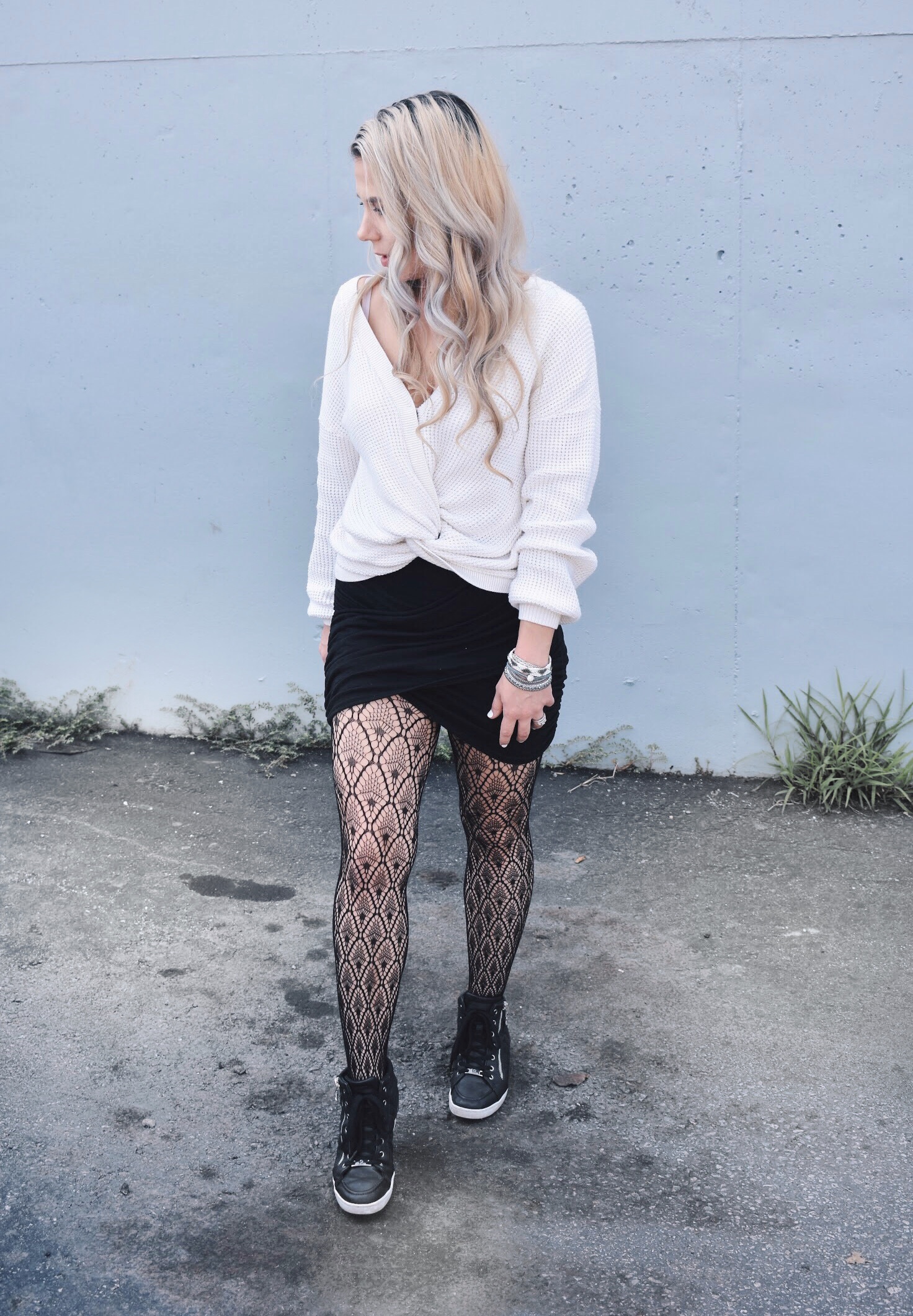 Black Sweater Dress  Dress with stockings, Fish net tights outfit, How to  style fishnets