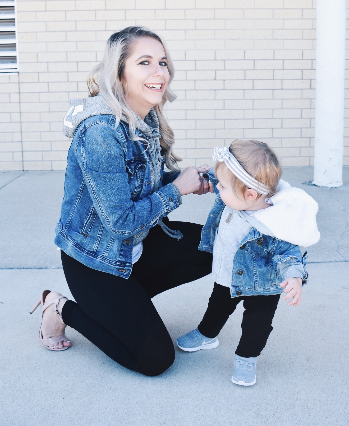 Mommy and Me Matching Outfits - Mom and Baby Girl Matching Outfits - Here's some of the best Mommy and Me Outfit Ideas on the Internet! This casual Mommy and Me style jean jacket over hoodie look can work for a baby girl or baby boy and is easy to pull together with items you both probably already have in your closets. Jean jacket outfit ideas, Hoodie outfit ideas, Casual Fall Style, Casual Fall Outfit. #LikeTKit #Fashion #MommyandMe #Twinning