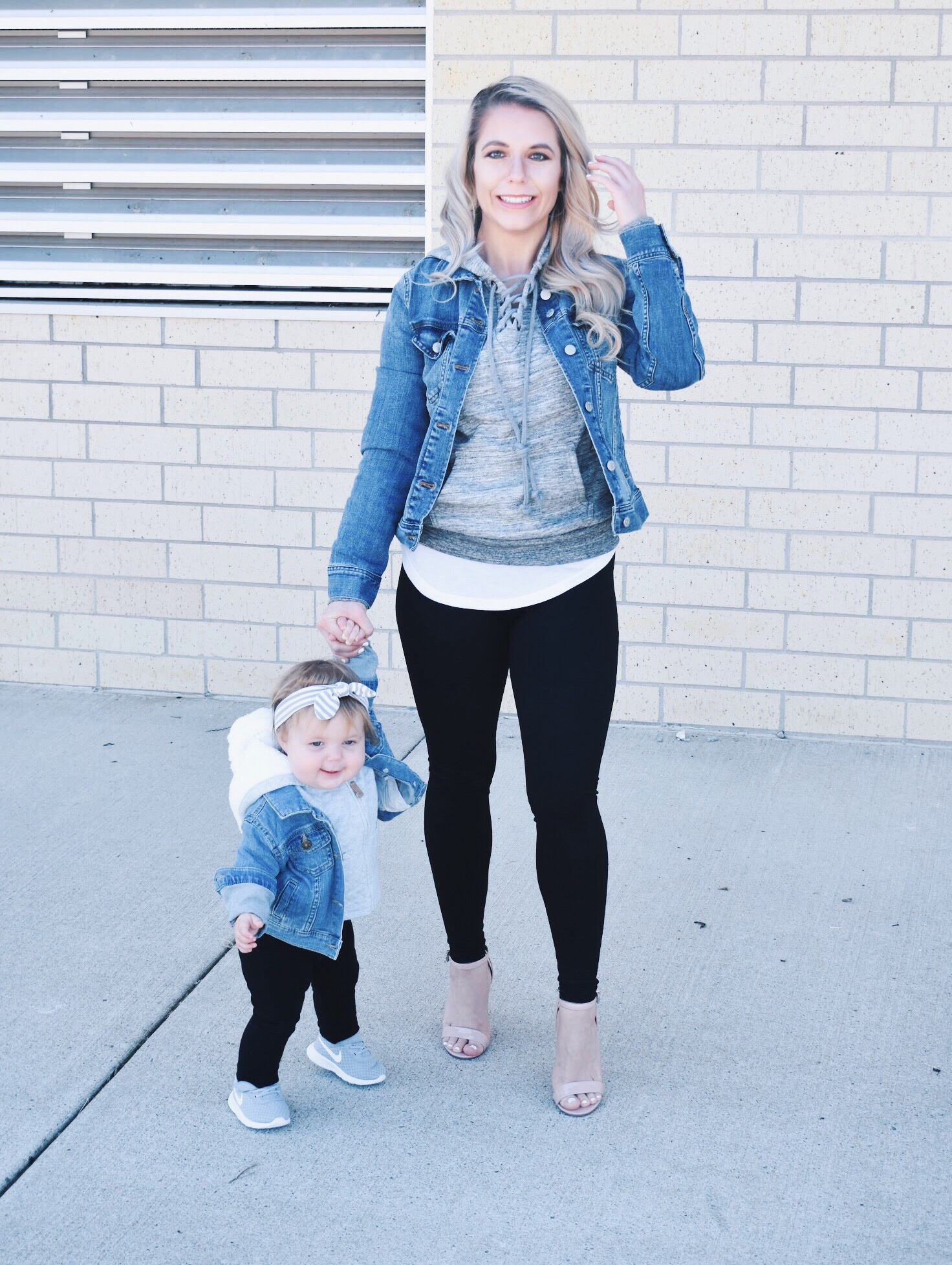 Mommy and Me Matching Outfits - Mom and Baby Girl Matching Outfits - Here's some of the best Mommy and Me Outfit Ideas on the Internet! This casual Mommy and Me style jean jacket over hoodie look can work for a baby girl or baby boy and is easy to pull together with items you both probably already have in your closets. Jean jacket outfit ideas, Hoodie outfit ideas, Casual Fall Style, Casual Fall Outfit. #LikeTKit #Fashion #MommyandMe #Twinning