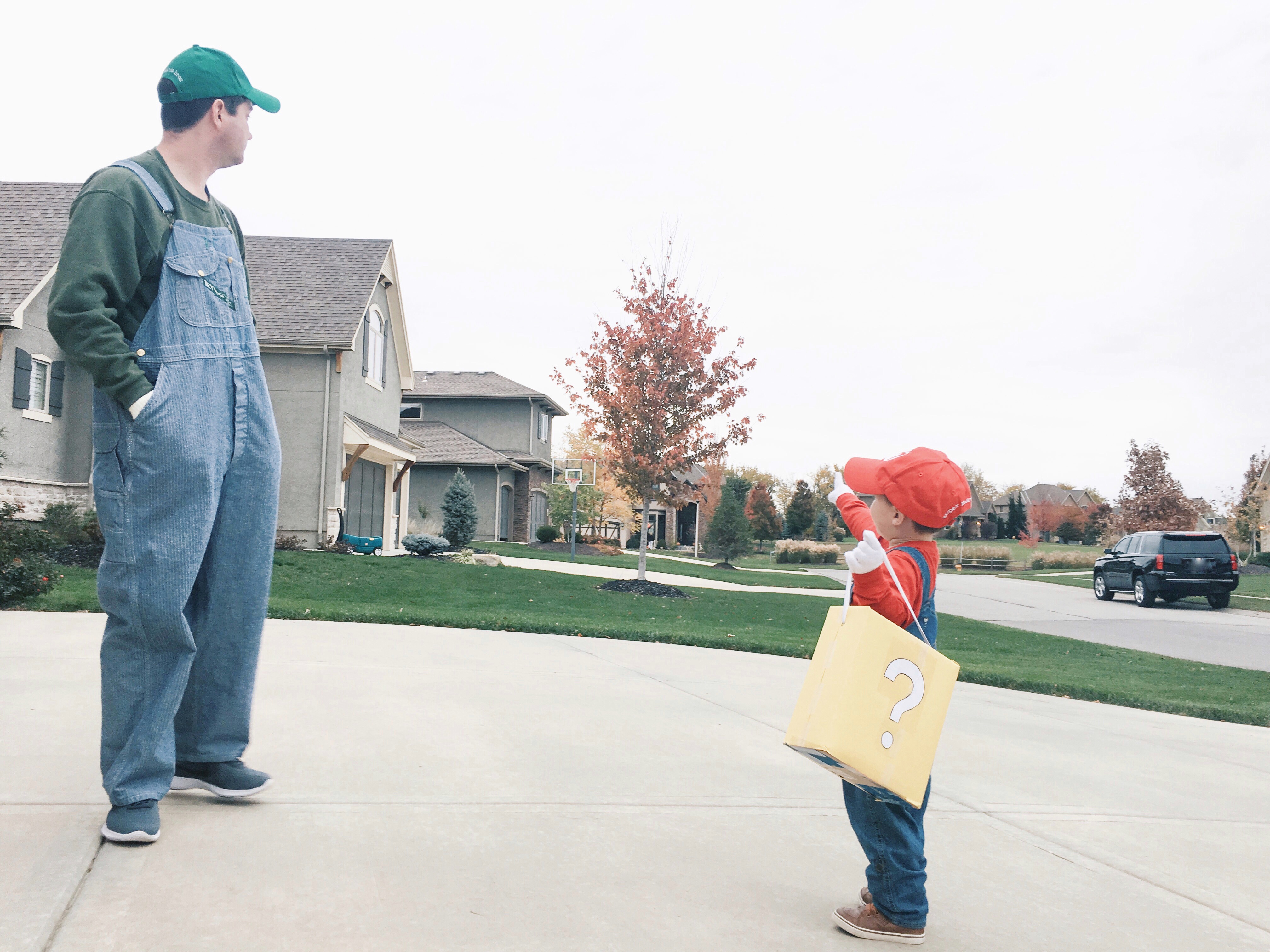 Super Mario Halloween Costumes Family - DIY Family Halloween Costume Ideas for the Super Mario-loving family! Mario Costume, Luigi Costume, Princess Peach Costume, and Princess Daisy Costume come together for a Super Mario Family Halloween Costume that will surely be a hit! #Halloween #FamilyCostumes #Mario