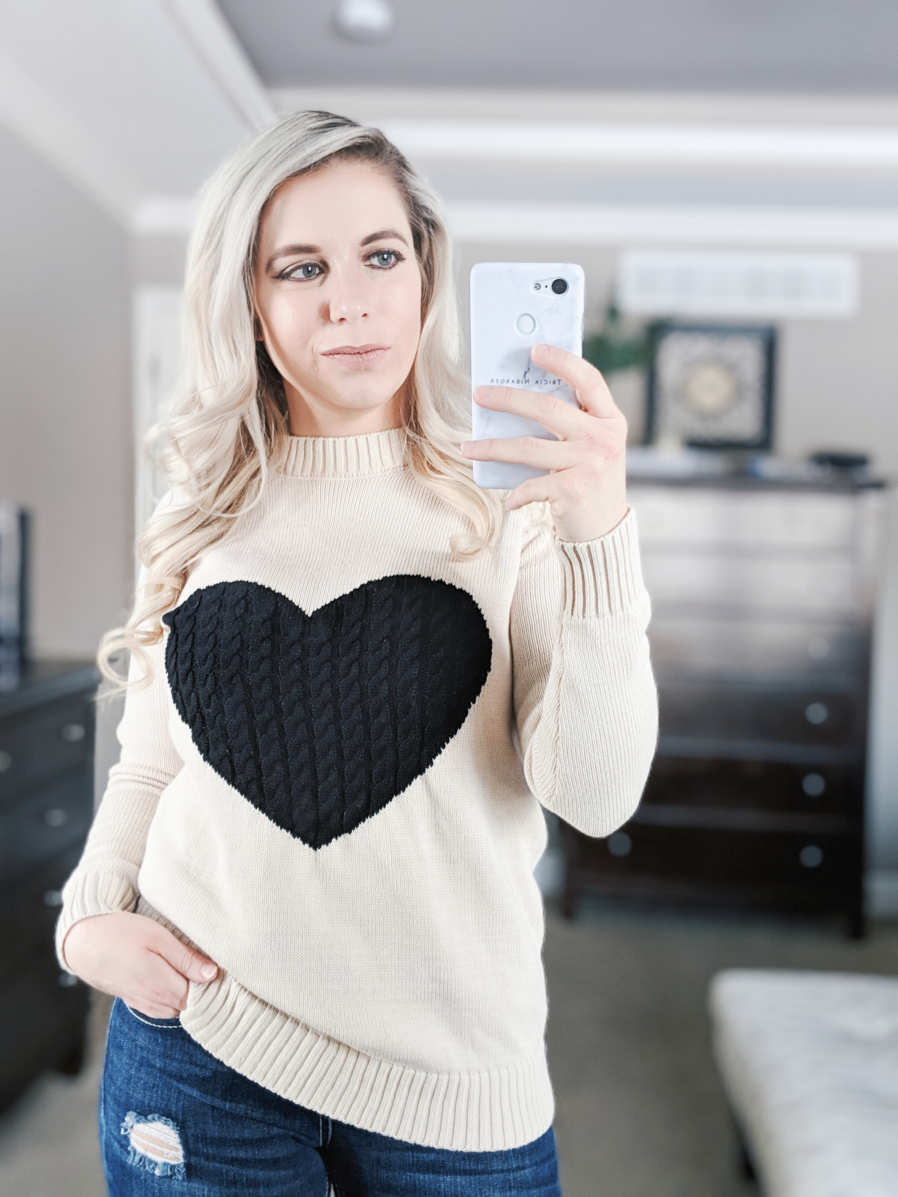 Cute Valentine's Day Outfit Ideas for Women: 5 affordable outfits from Amazon that will be perfect for Valentine's Day 2019! This fashion blogger try-on haul includes sexy Valentine's Day outfits, heart sweaters, heart pom cardigans, and more. Get the cutest affordable fashion for Valentine's Day with these inspiring looks!