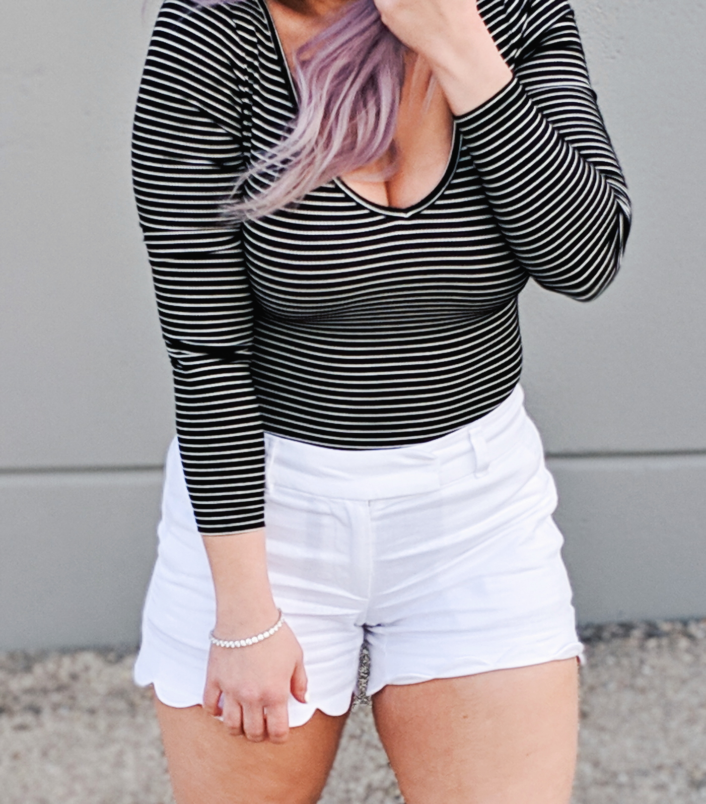 #sponsored This gorgeous tennis bracelet is the perfect finishing touch to this black and white spring outfit! The tennis bracelet is from @Kohls fine jewelry collection and matches everything! I love the sparkle it adds to this black bodysuit and white scalloped shorts outfit for spring fashion 2019. #KohlsJewelry #KohlsFinds #WomensFashion #SpringStyle 