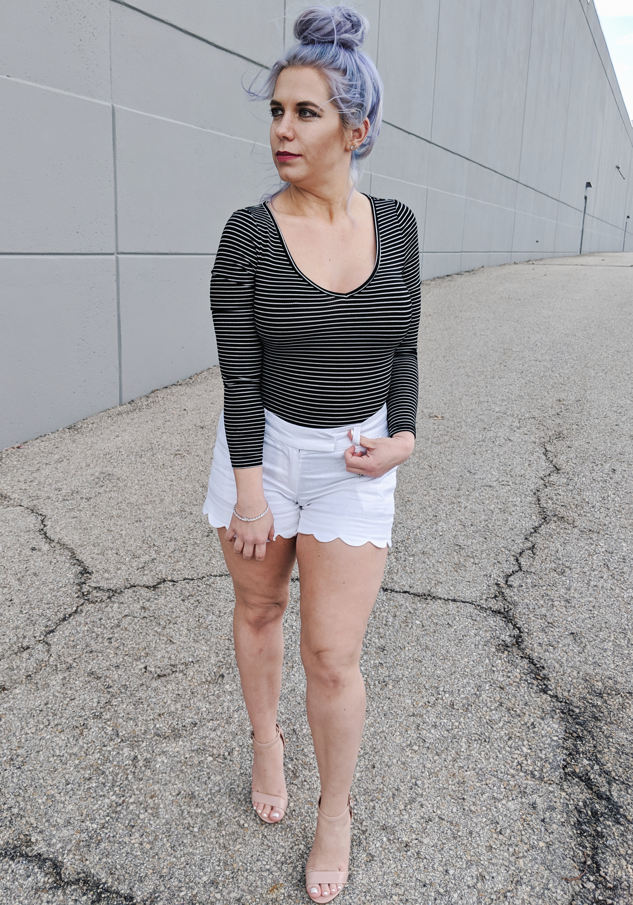 #sponsored This gorgeous tennis bracelet is the perfect finishing touch to this black and white spring outfit! The tennis bracelet is from @Kohls fine jewelry collection and matches everything! I love the sparkle it adds to this black bodysuit and white scalloped shorts outfit for spring fashion 2019. #KohlsJewelry #KohlsFinds #WomensFashion #SpringStyle 