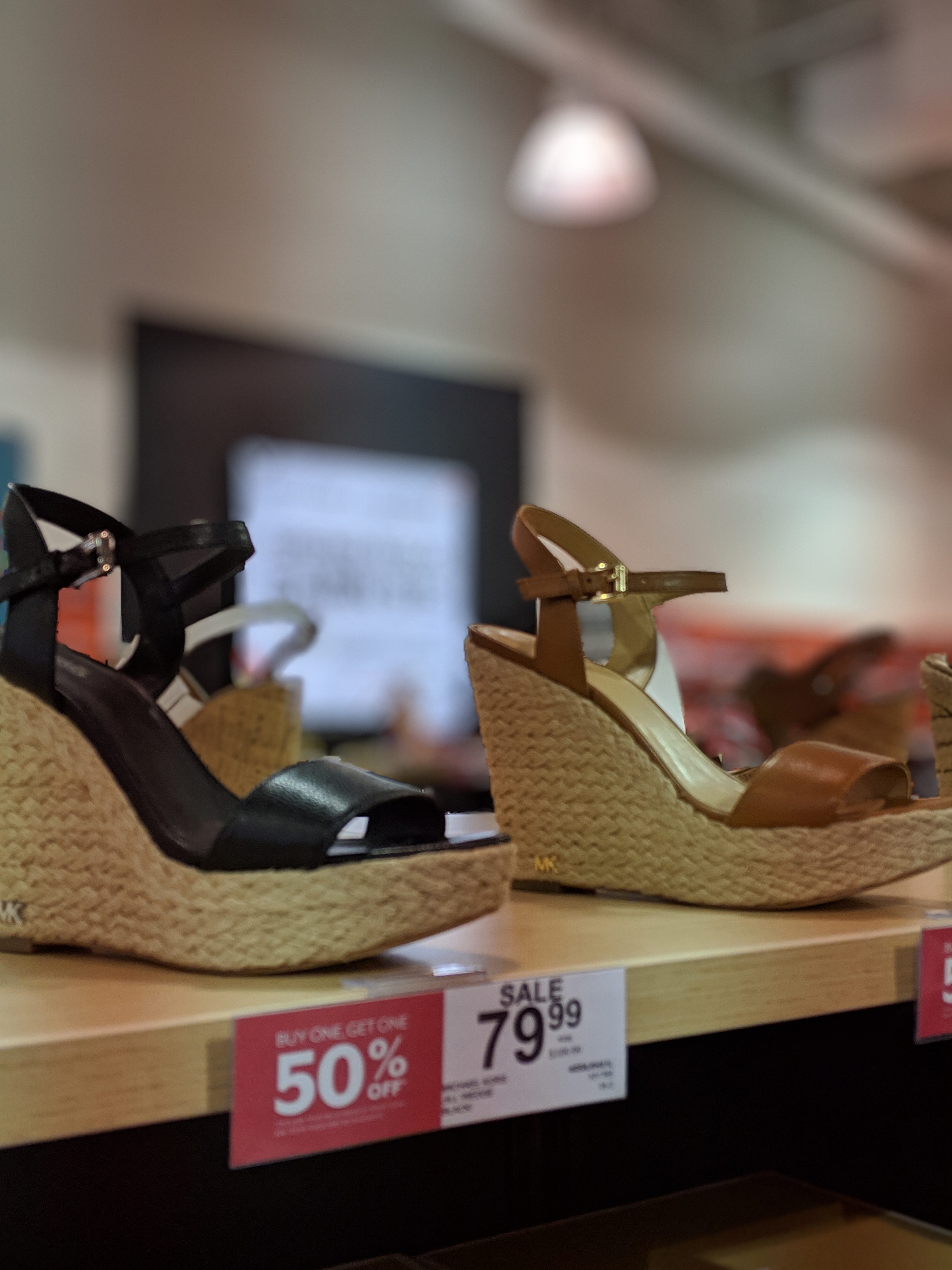 Cute Shoes for Spring 2019 - Where to find the best cute shoes for spring 2019! Kansas City fashion blogger Tricia Nibarger of COVET by tricia showcases the shoe selection at Off Broadway Shoes at Legends Outlets in Kansas City. (ad) Strappy nude sandals are paired with a pink leather mini skirt, black bodysuit, and cute bralette. #obshoes #fashion #style #fashionista #styleinspo