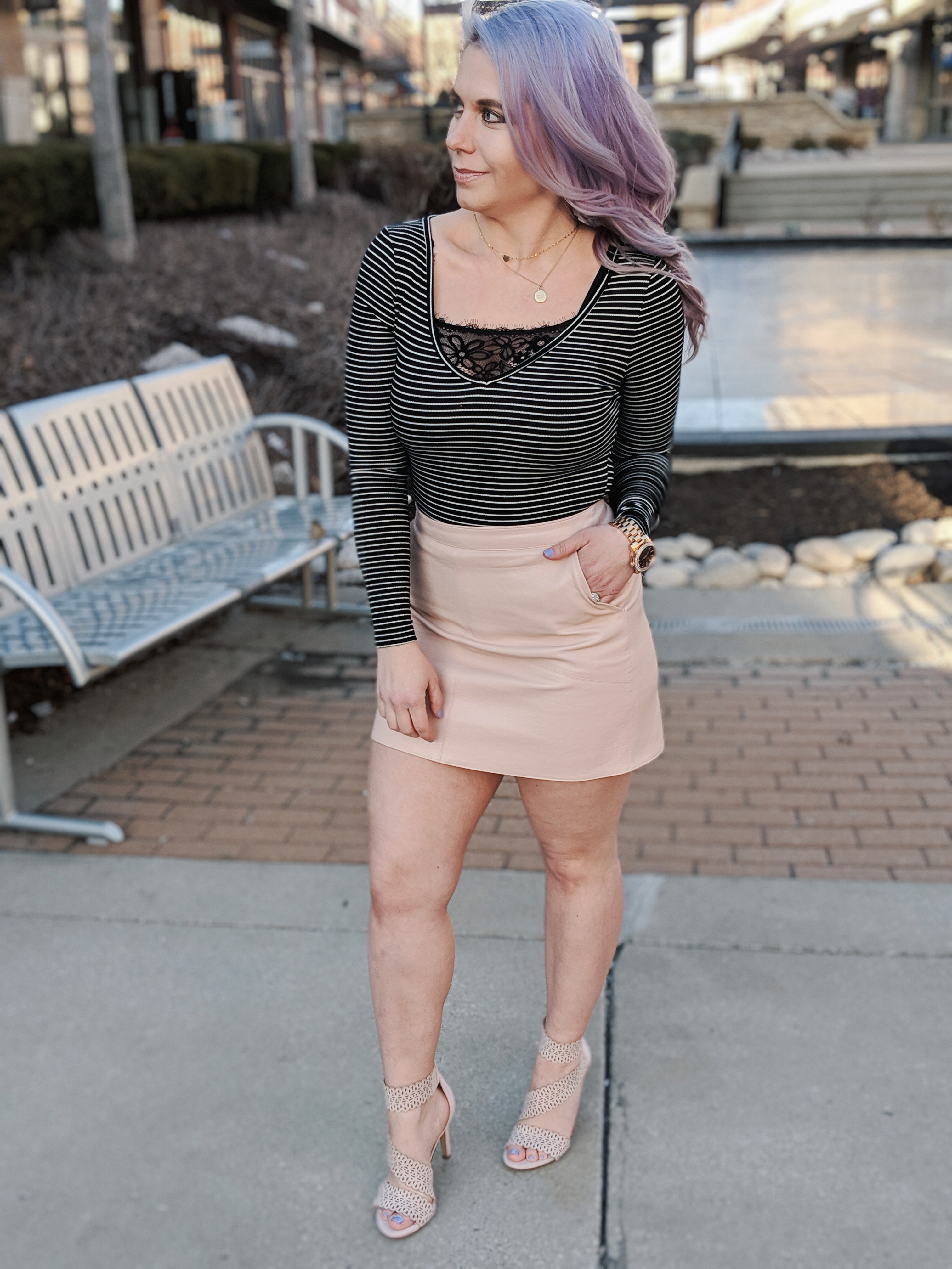 Cute Shoes for Spring 2019 - Where to find the best cute shoes for spring 2019! Kansas City fashion blogger Tricia Nibarger of COVET by tricia showcases the shoe selection at Off Broadway Shoes at Legends Outlets in Kansas City. (ad) Strappy nude sandals are paired with a pink leather mini skirt, black bodysuit, and cute bralette. #obshoes #fashion #style #fashionista #styleinspo