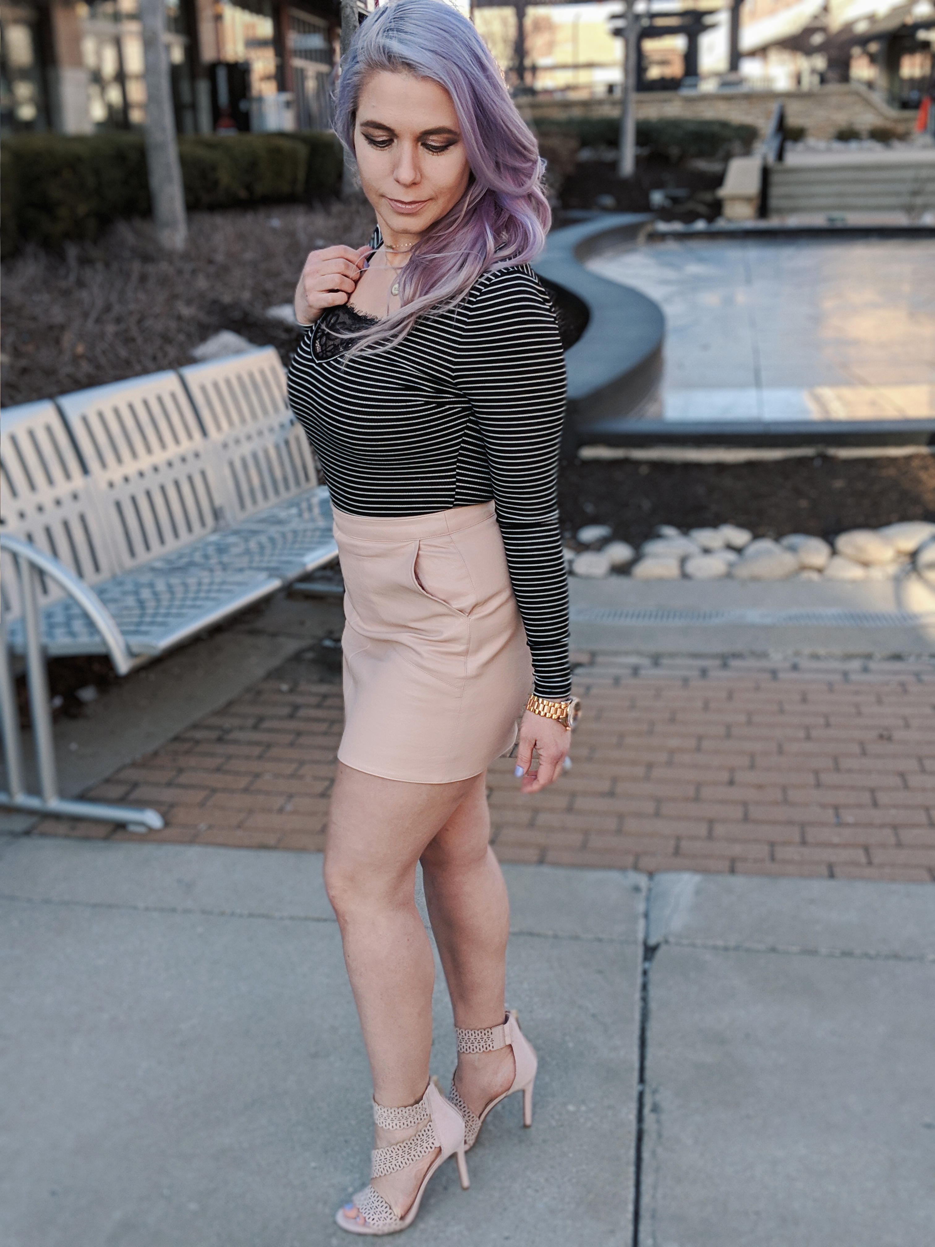 Cute Shoes for Spring 2019 - Where to find the best cute shoes for spring 2019! Kansas City fashion blogger Tricia Nibarger of COVET by tricia showcases the shoe selection at Off Broadway Shoes at Legends Outlets in Kansas City. (ad) Strappy nude sandals are paired with a pink leather mini skirt, black bodysuit, and cute bralette. #obshoes #fashion #style #fashionista #styleinspo