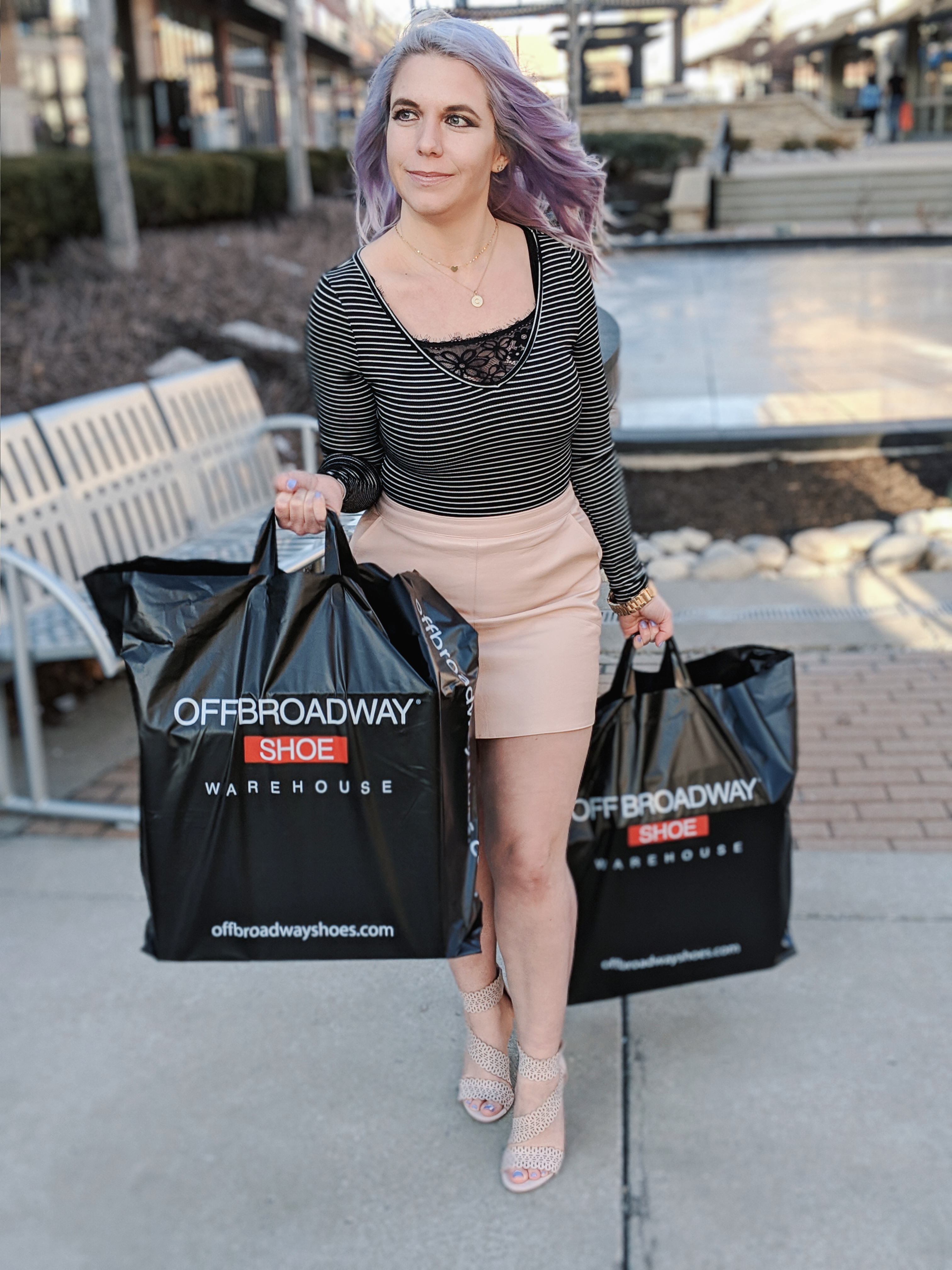 Cute Shoes for Spring 2019 - Where to find the best cute shoes for spring 2019! Kansas City fashion blogger Tricia Nibarger of COVET by tricia showcases the shoe selection at Off Broadway Shoes at Legends Outlets in Kansas City. (ad) Strappy nude sandals are paired with a pink leather mini skirt, black bodysuit, and cute bralette. #obshoes #fashion #style #fashionista #styleinspo