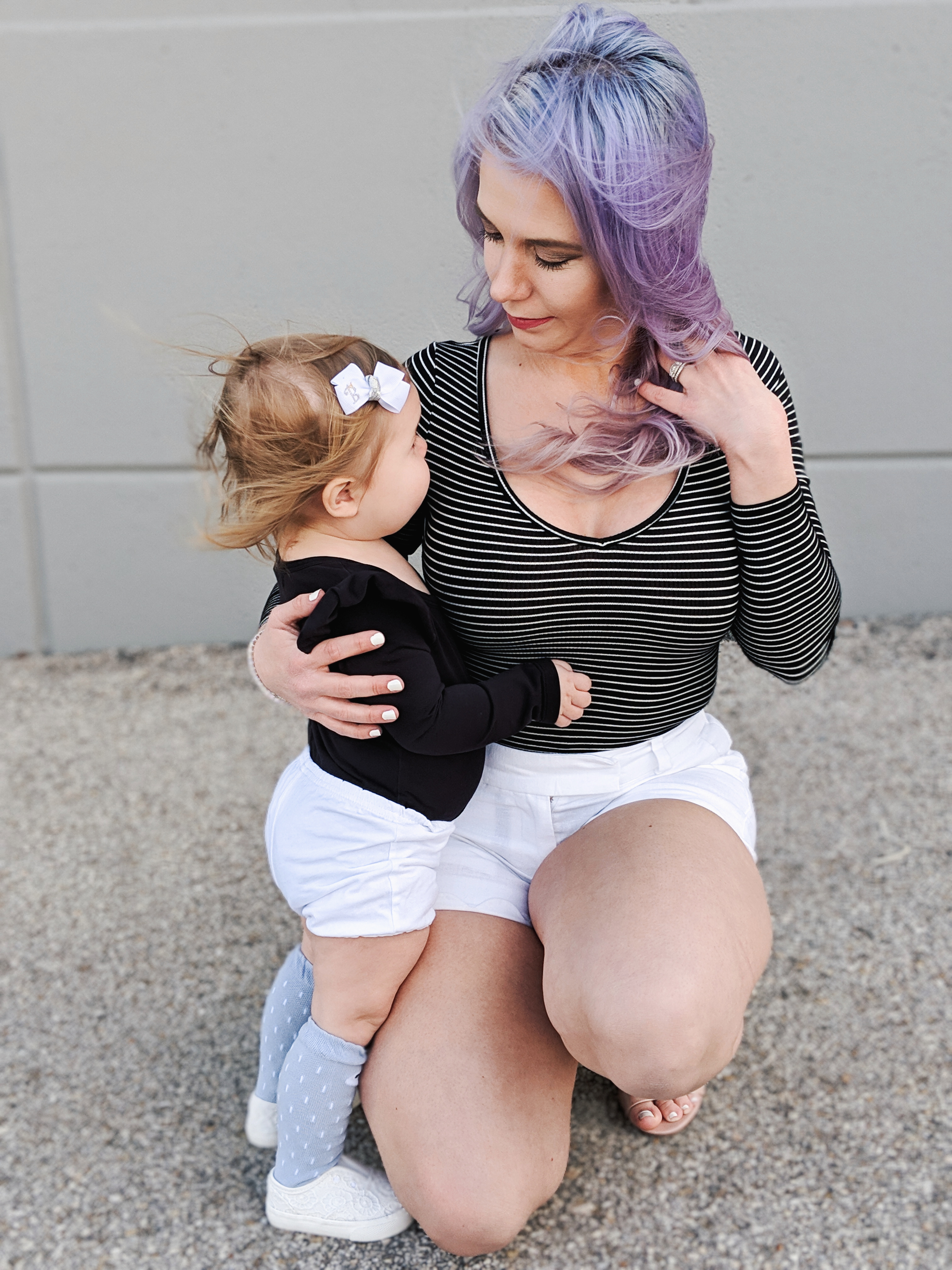 #sponsored This gorgeous tennis bracelet is the perfect finishing touch to this black and white spring outfit! The tennis bracelet is from @Kohls fine jewelry collection and matches everything! I love the sparkle it adds to this black bodysuit and white scalloped shorts outfit for spring fashion 2019. #KohlsJewelry #KohlsFinds #WomensFashion #SpringStyle 