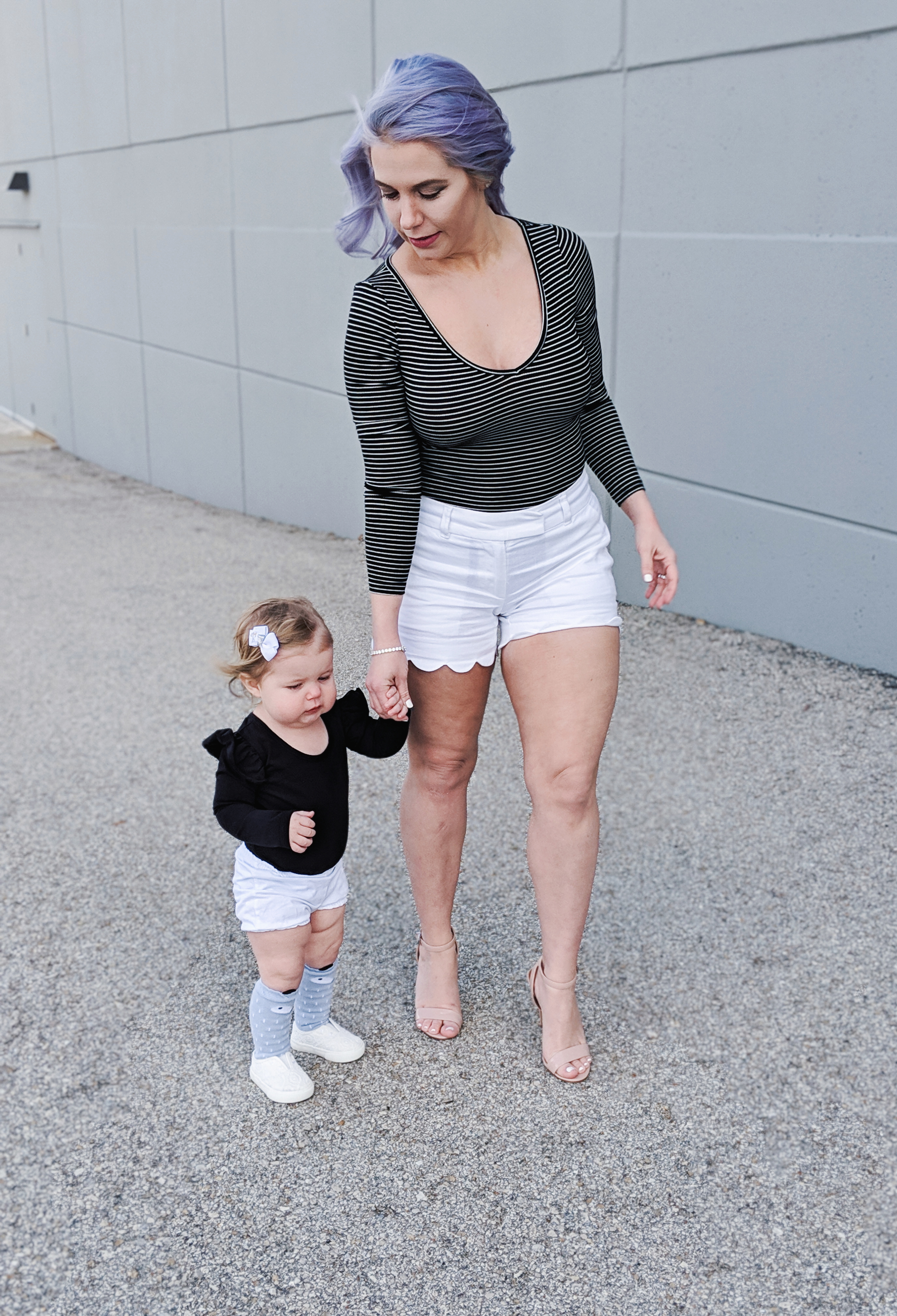 #sponsored This gorgeous tennis bracelet is the perfect finishing touch to this black and white spring outfit! The tennis bracelet is from @Kohls fine jewelry collection and matches everything! I love the sparkle it adds to this black bodysuit and white scalloped shorts outfit for spring fashion 2019. #KohlsJewelry #KohlsFinds #WomensFashion #SpringStyle 