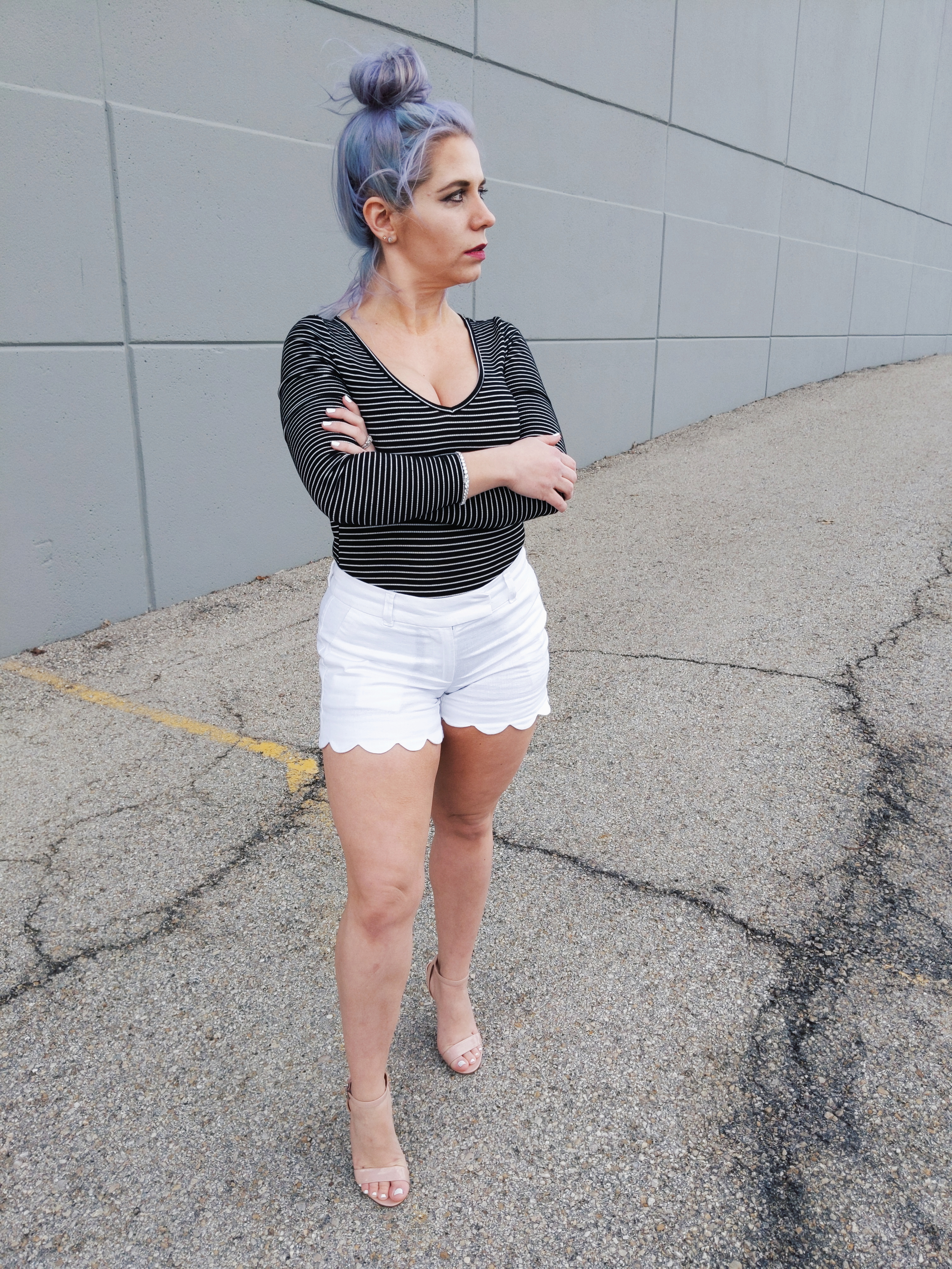 #sponsored This gorgeous tennis bracelet is the perfect finishing touch to this black and white spring outfit! The tennis bracelet is from @Kohls fine jewelry collection and matches everything! I love the sparkle it adds to this black bodysuit and white scalloped shorts outfit for spring fashion 2019. #KohlsJewelry #KohlsFinds #WomensFashion #SpringStyle 