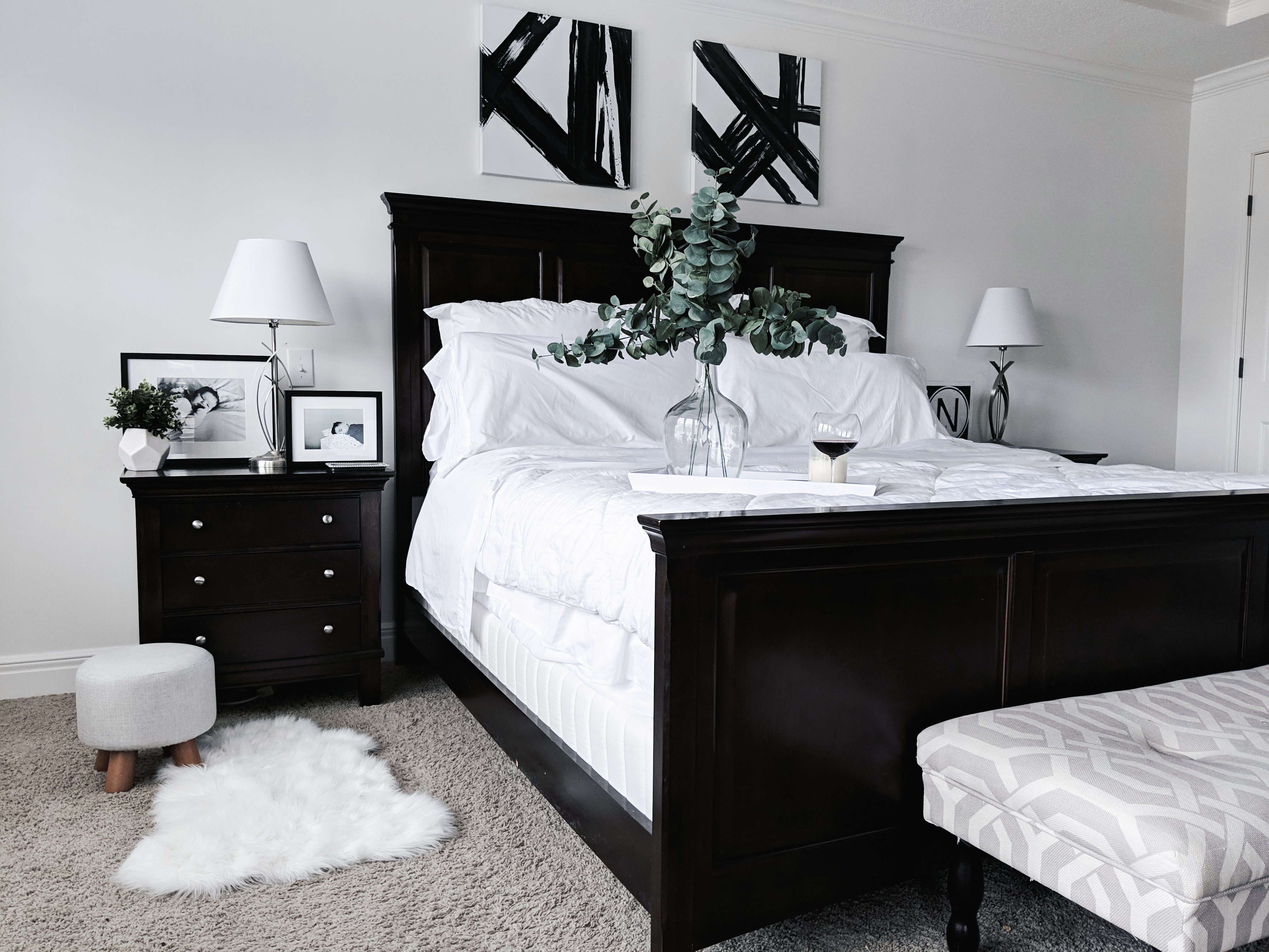 Black and White Master Bedroom Ideas: Inspiration for a monochrome master bedroom with classic black and white decor. Keep your bedroom sleek and modern with this chic black and white decor. The best part: all sources are affordable! Master bedroom inspo, master bedroom decor, white bedding, white bedroom. #MasterBedroom #HomeDecor #Modern #LTKhome