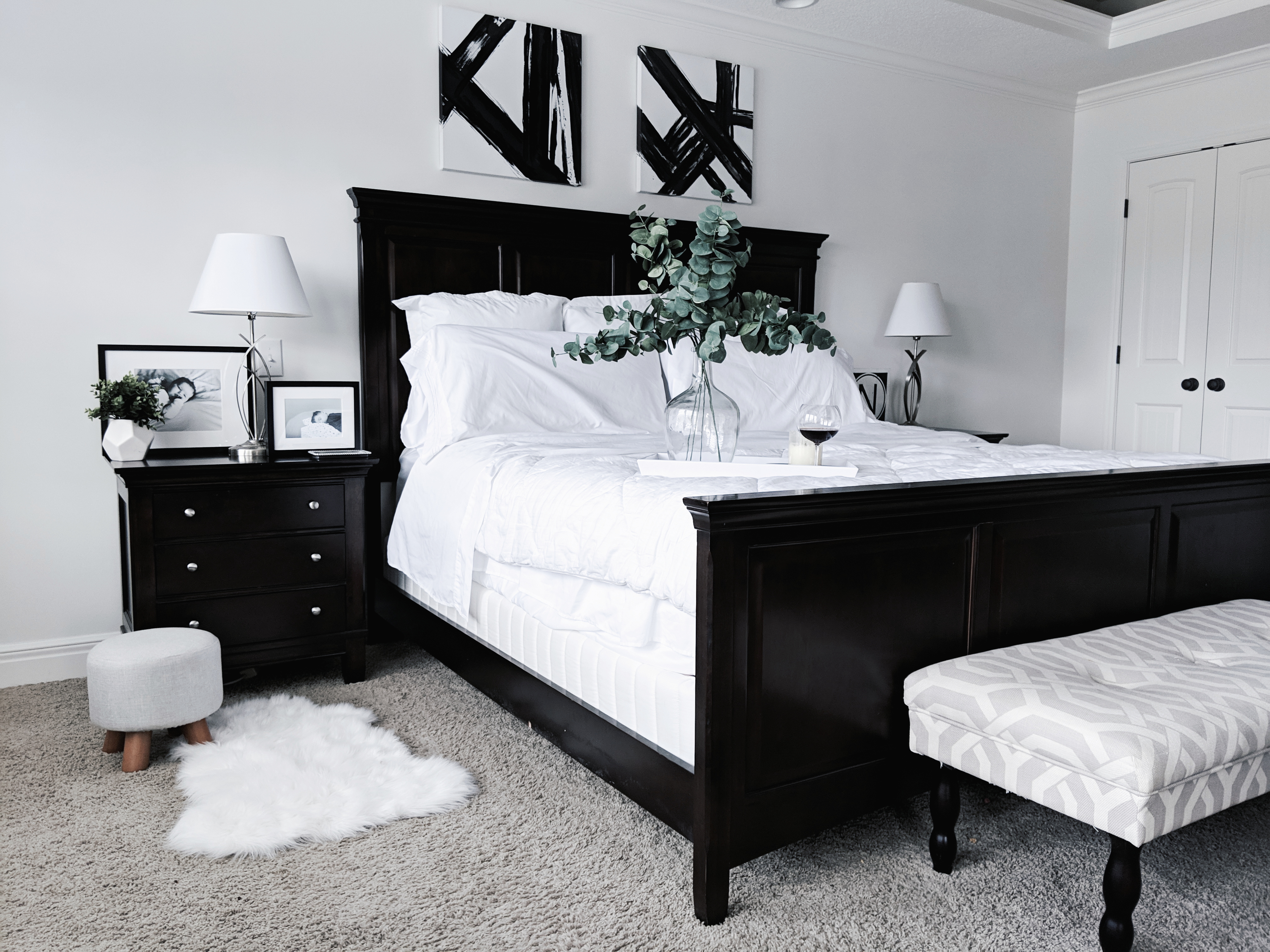 Black and White Master Bedroom Ideas: Inspiration for a monochrome master bedroom with classic black and white decor. Keep your bedroom sleek and modern with this chic black and white decor. The best part: all sources are affordable! Master bedroom inspo, master bedroom decor, white bedding, white bedroom. #MasterBedroom #HomeDecor #Modern #LTKhome