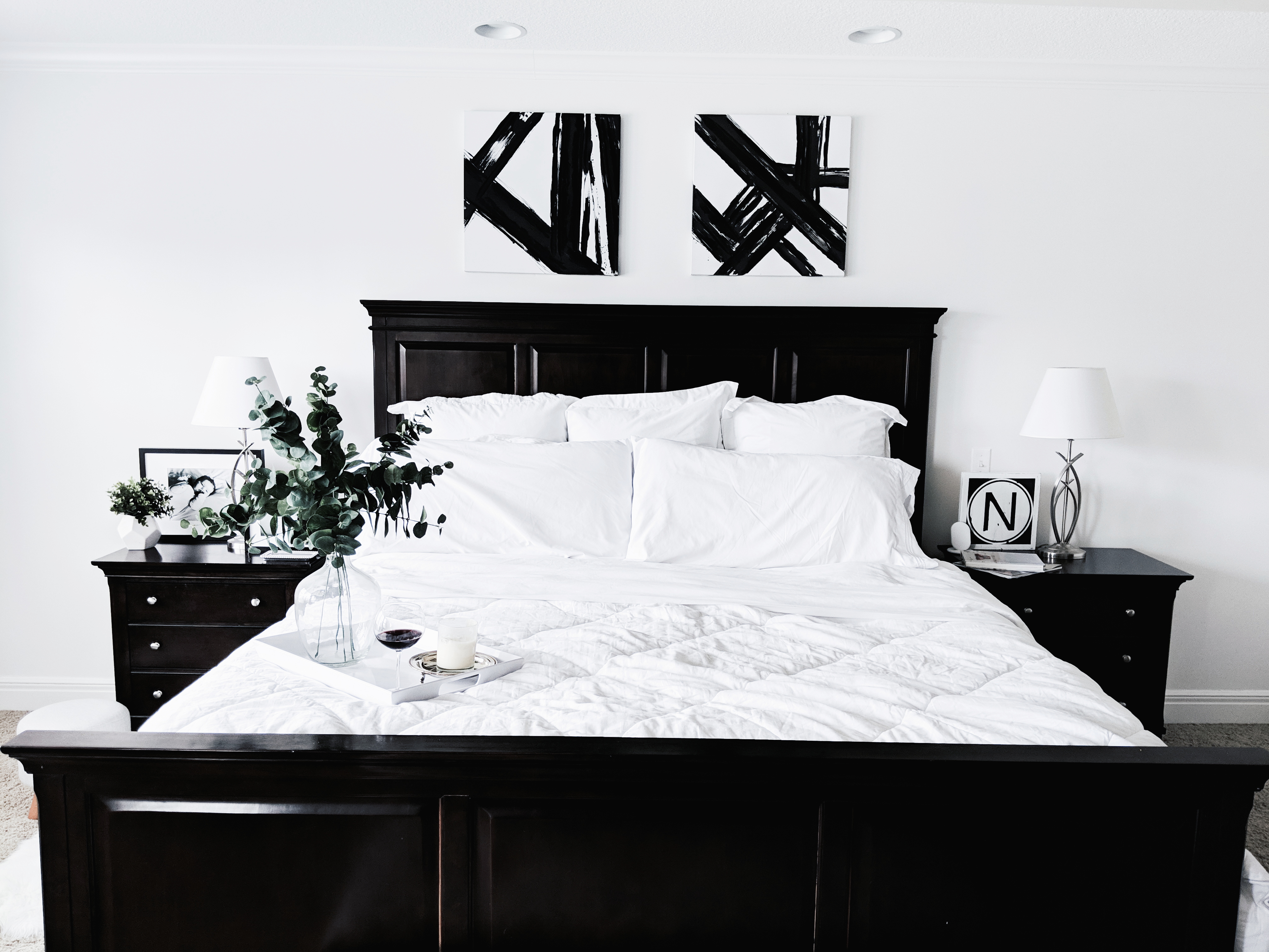 Black and White Master Bedroom Ideas: Inspiration for a monochrome master bedroom with classic black and white decor. Keep your bedroom sleek and modern with this chic black and white decor. The best part: all sources are affordable! Master bedroom inspo, master bedroom decor, white bedding, white bedroom. #MasterBedroom #HomeDecor #Modern #LTKhome