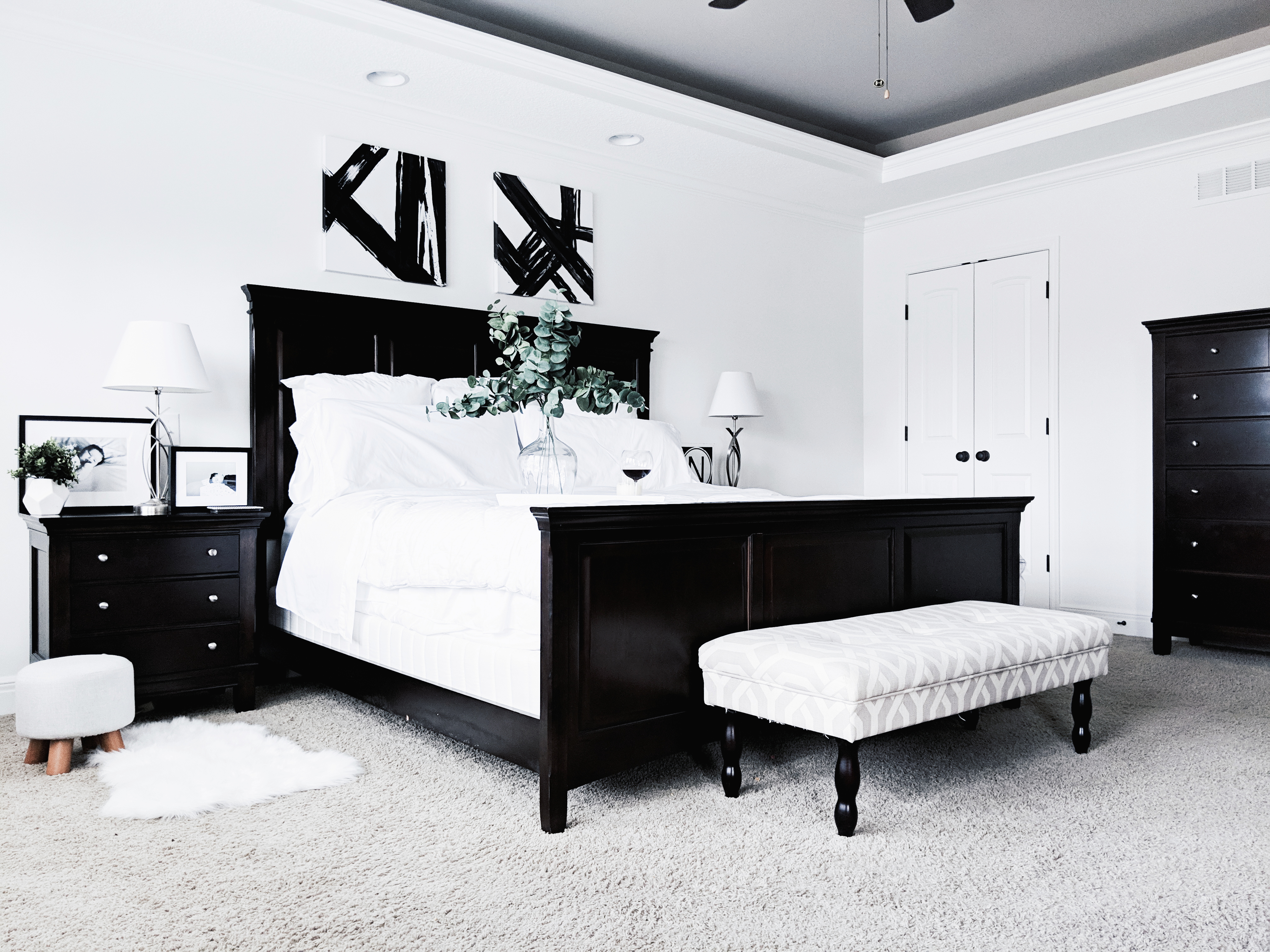 Black and White Master Bedroom Ideas: Inspiration for a monochrome master bedroom with classic black and white decor. Keep your bedroom sleek and modern with this chic black and white decor. The best part: all sources are affordable! Master bedroom inspo, master bedroom decor, white bedding, white bedroom. #MasterBedroom #HomeDecor #Modern #LTKhome