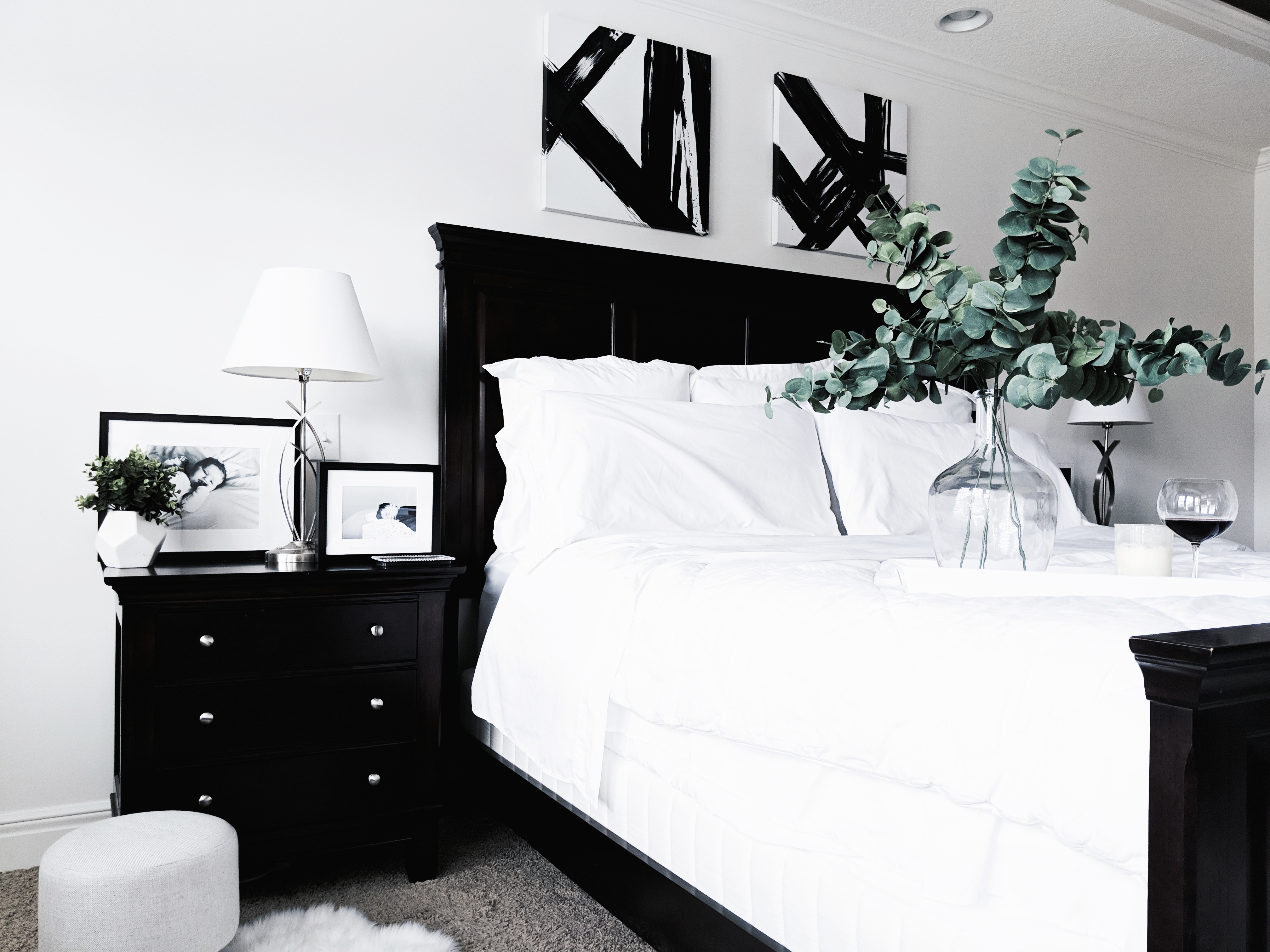 Black and White Master Bedroom Ideas: Inspiration for a monochrome master bedroom with classic black and white decor. Keep your bedroom sleek and modern with this chic black and white decor. The best part: all sources are affordable! Master bedroom inspo, master bedroom decor, white bedding, white bedroom. #MasterBedroom #HomeDecor #Modern #LTKhome