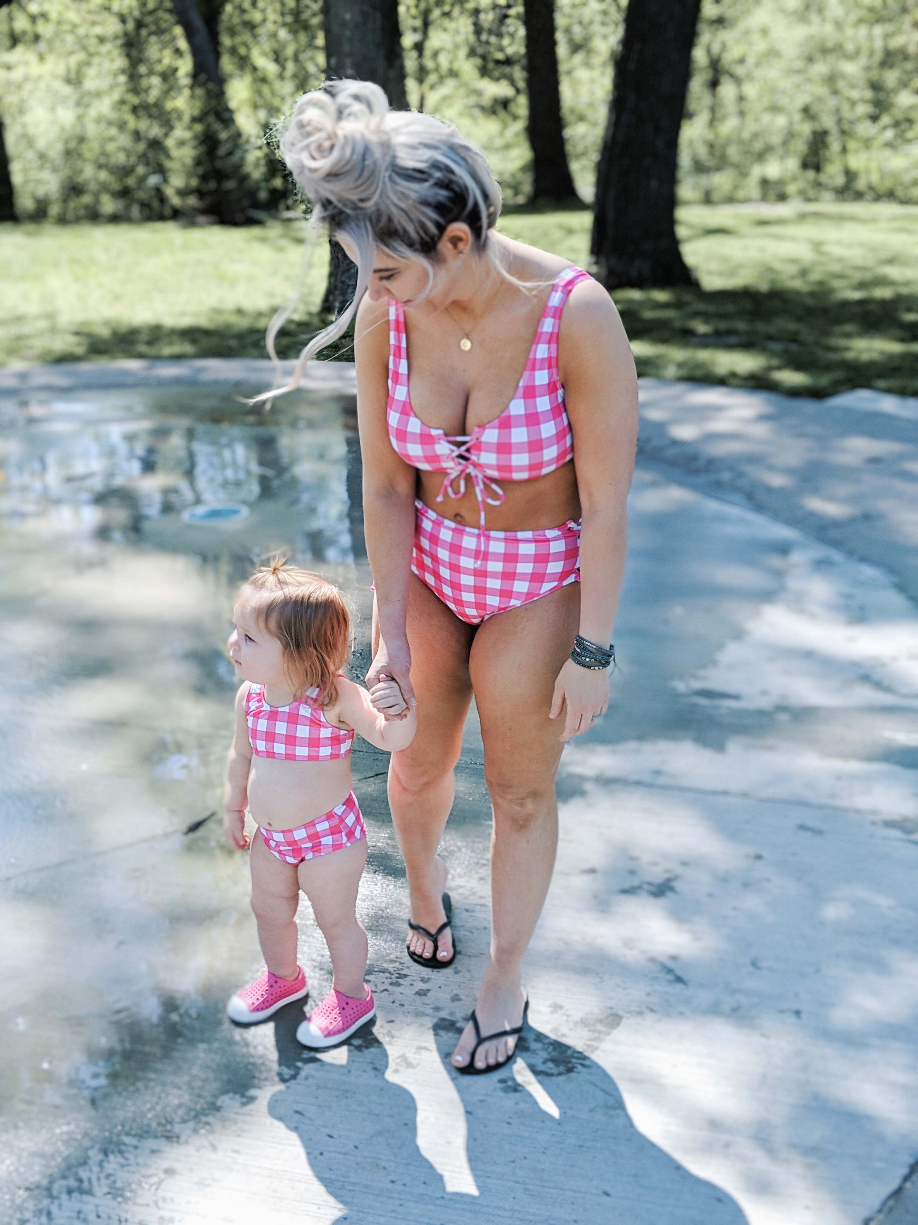 Mommy and Me Swimsuits Baby Girl: The cutest mommy and me swimsuits for baby girls! Featuring mommy and me one piece swimsuits and mommy and me bikini swimsuits so you'll find the best mommy and me swimwear for you and your mini me! Fashion blogger Tricia Nibarger of COVET by tricia showcases mommy and me swimsuits with her daughter. #mommyandme #girlmom #swimsuits