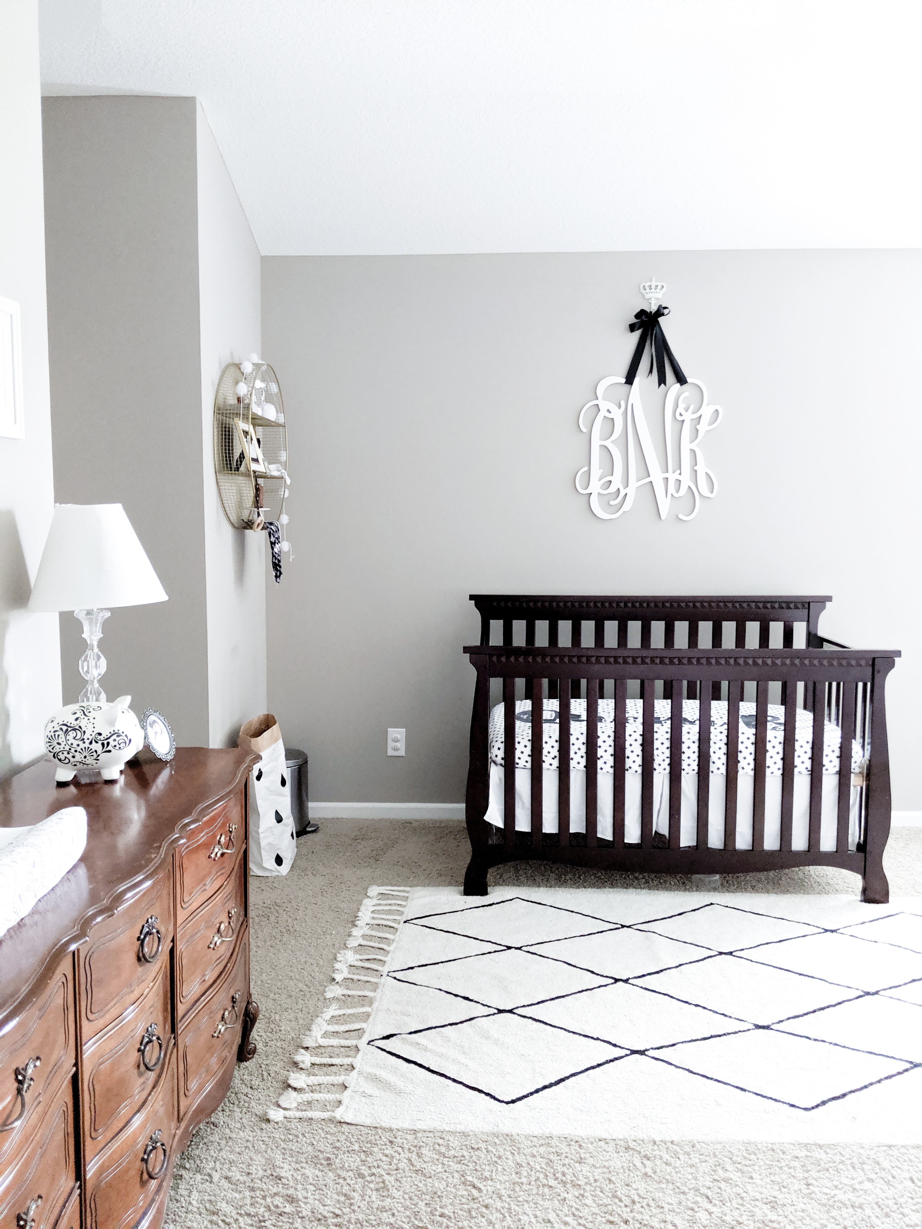 This is the cutest baby girl nursery! Exactly how I want my baby girl nursery to look. I love that it's a baby girl nursery not pink! Baby girl nursery monochrome, grey and white nursery, baby girl nursery ideas not pink. #babygirlnursery #nurserydecor #girlnursery 