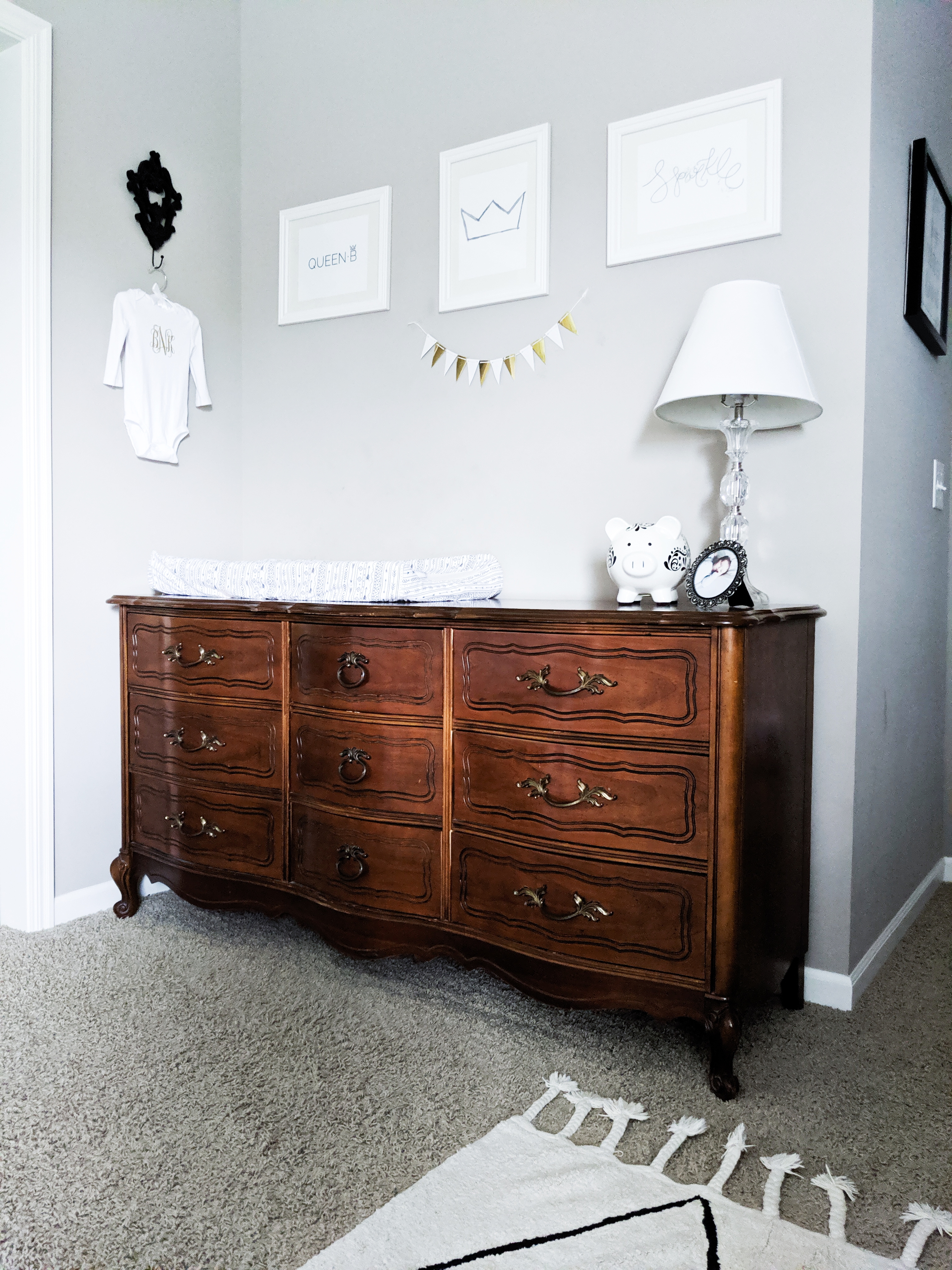 This is the cutest baby girl nursery! Exactly how I want my baby girl nursery to look. I love that it's a baby girl nursery not pink! Baby girl nursery monochrome, grey and white nursery, baby girl nursery ideas not pink. #babygirlnursery #nurserydecor #girlnursery 
