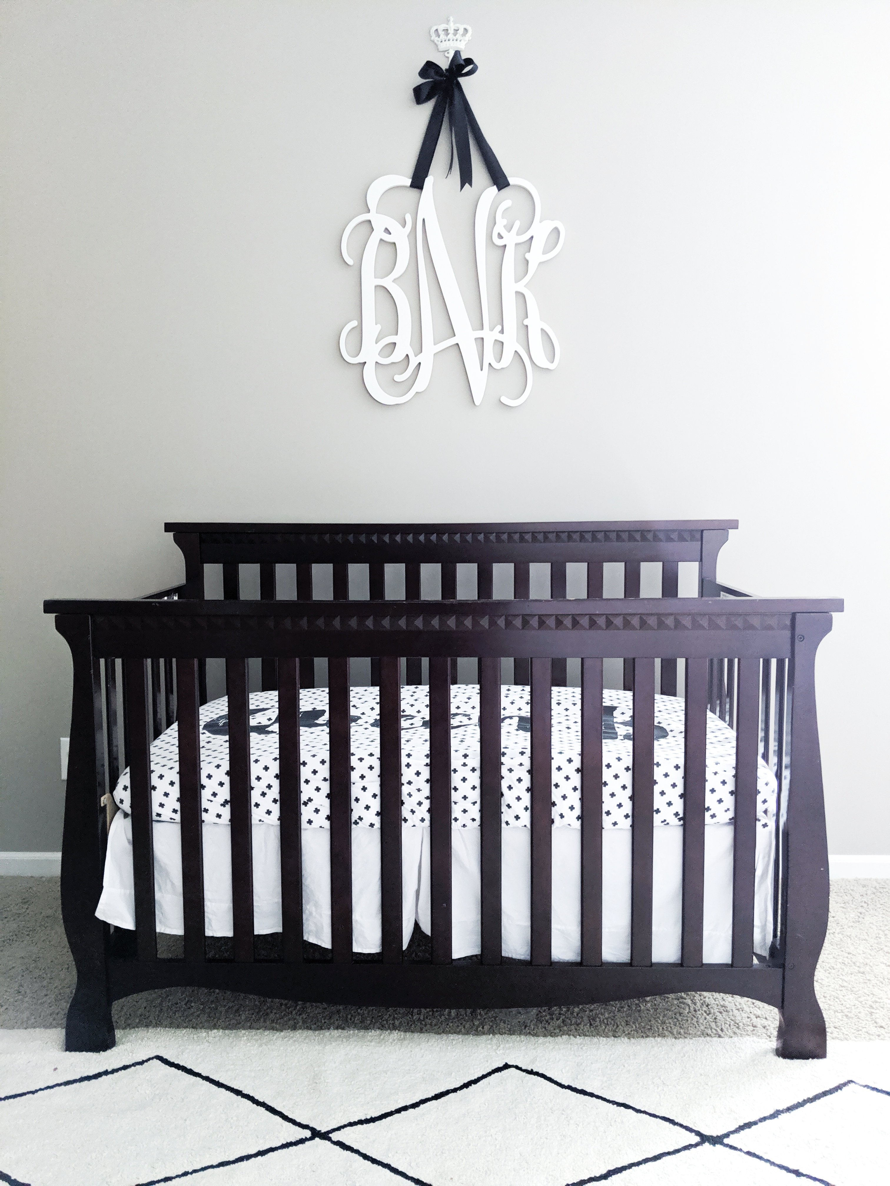 This is the cutest baby girl nursery! Exactly how I want my baby girl nursery to look. I love that it's a baby girl nursery not pink! Baby girl nursery monochrome, grey and white nursery, baby girl nursery ideas not pink. #babygirlnursery #nurserydecor #girlnursery 