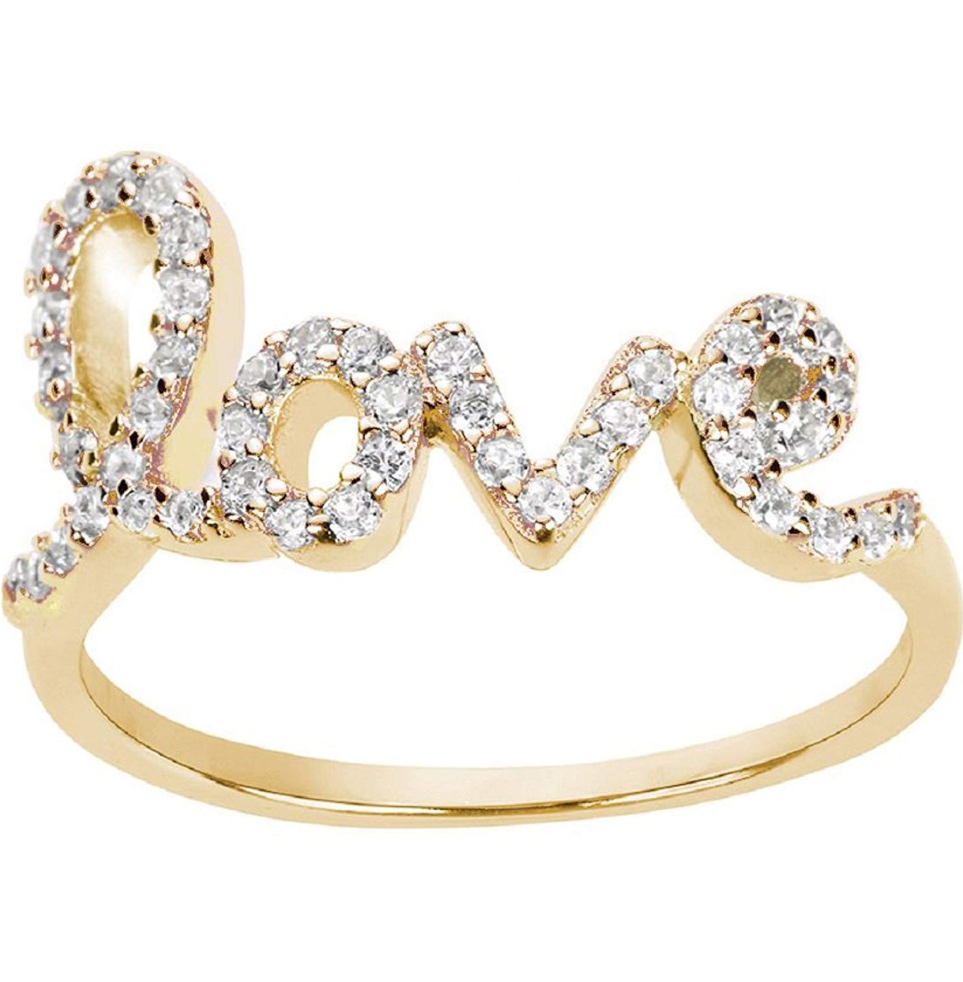 The Best Diamond Love Ring Dupes - Rounding up the best diamond love ring dupes! Love the Avanessi diamond love ring? I've found some great affordable love rings for you to choose from! #love #lovering #designerdupes #dupe 