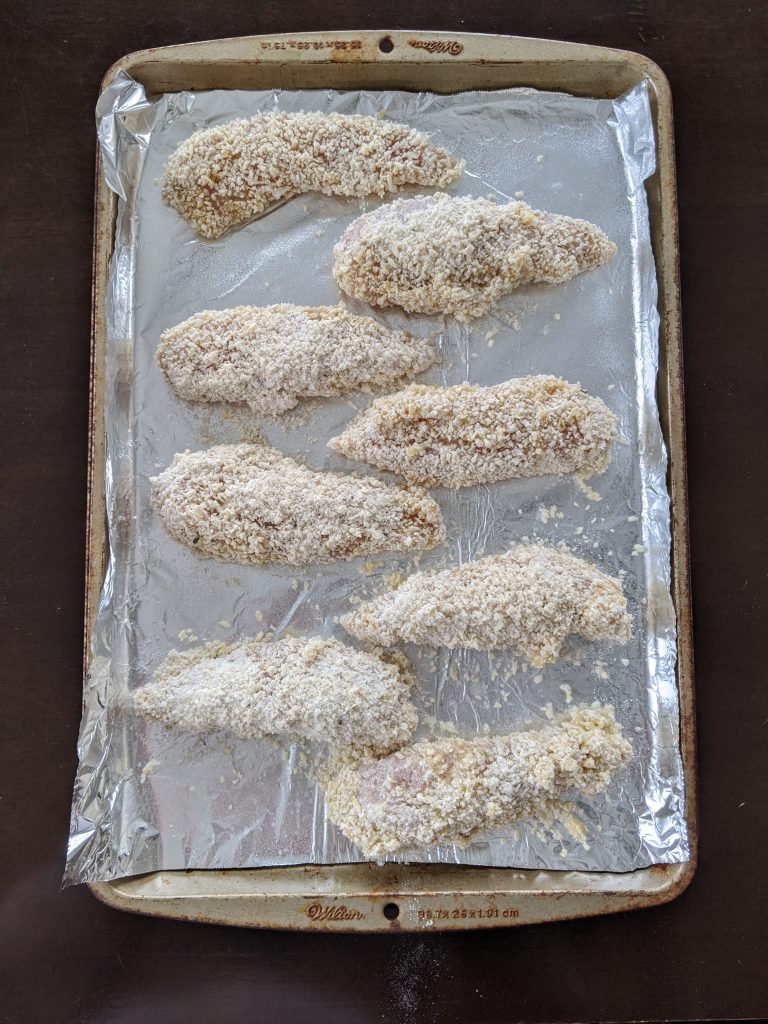 Baked Chicken Tenders with Crispy Panko Breading - This easy chicken tenders recipe with panko breading is a family favorite! The kids can even help prepare these! The panko breading makes them nice and crispy straight out of the oven, no need for frying. #chickenrecipes #chickentenders #kidfriendlyfoods 