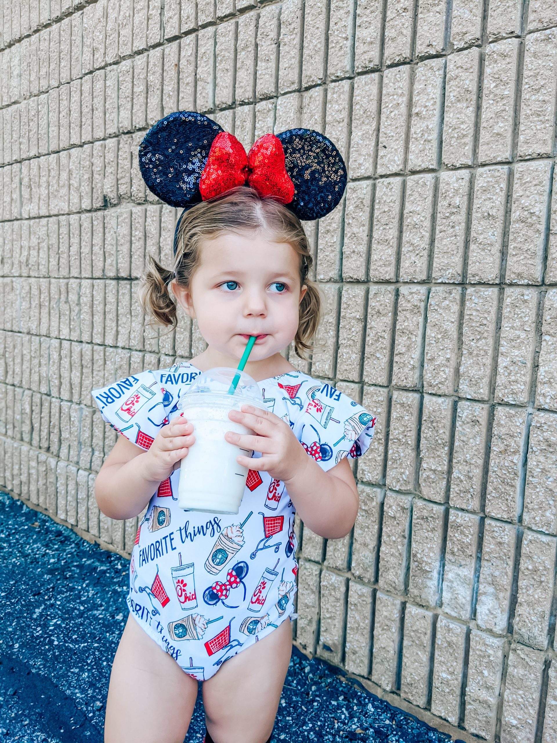 Disney Outfit Toddler Girl - Favorite Things Fabric - Favorite Things Leotard: The perfect Disney outfit for your toddler girl! This Lili.Lane Favorite Things leotard features Disney, Starbucks, Chick-fil-A, and Target all in one! #favoritethings #disney #leotard #littledancer #mouseears