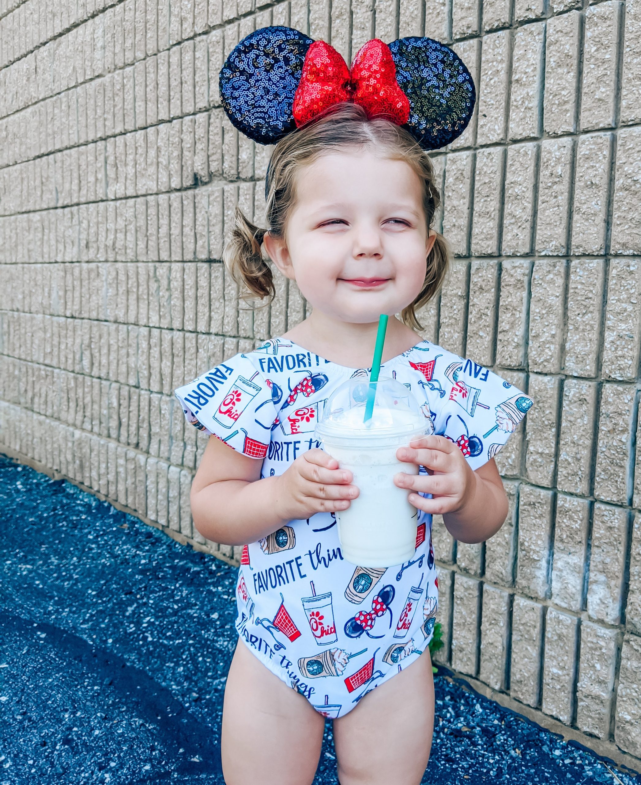 Disney Outfit Toddler Girl - Favorite Things Fabric - Favorite Things Leotard: The perfect Disney outfit for your toddler girl! This Lili.Lane Favorite Things leotard features Disney, Starbucks, Chick-fil-A, and Target all in one! #favoritethings #disney #leotard #littledancer #mouseears