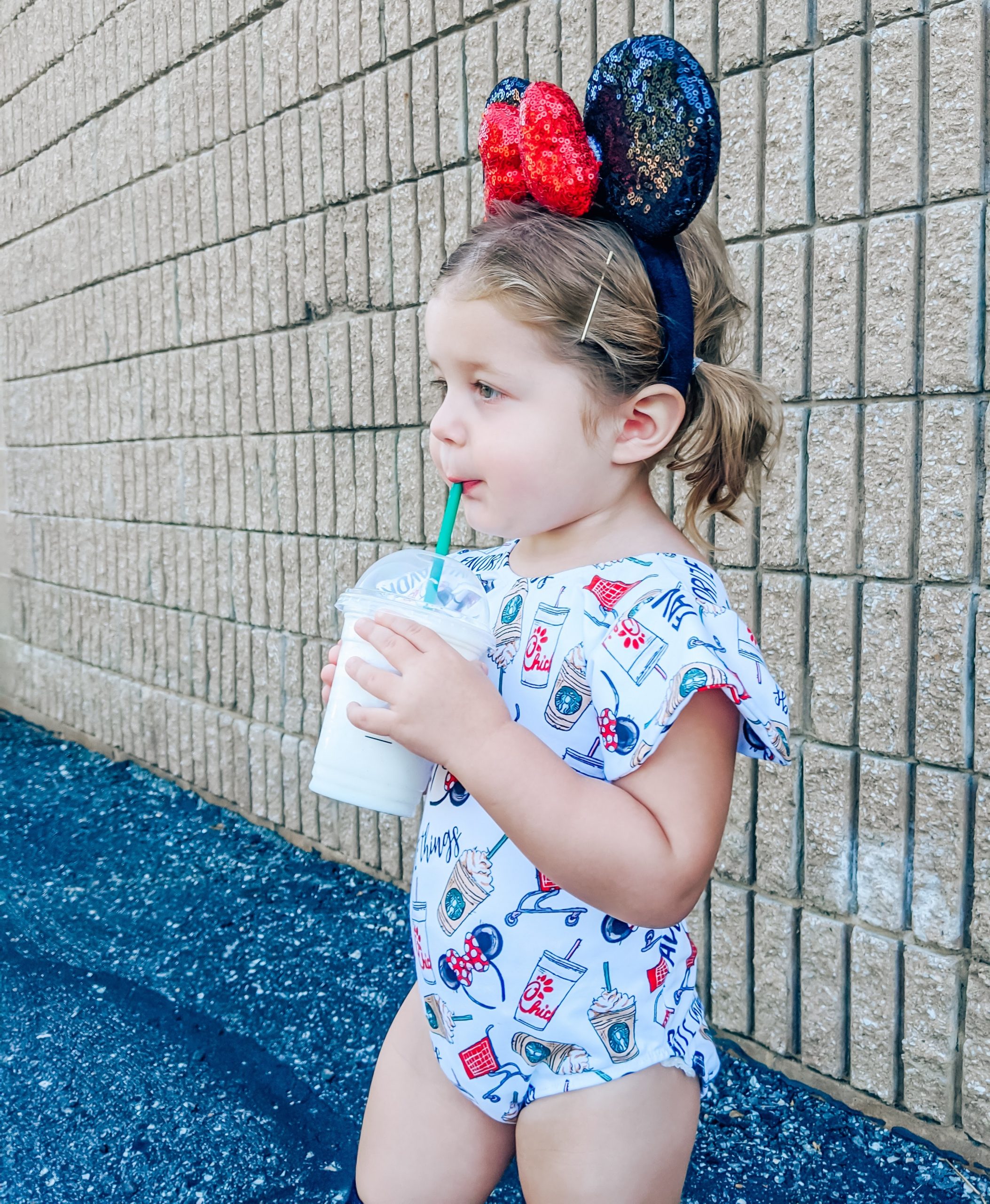 Disney Outfit Toddler Girl - Favorite Things Fabric - Favorite Things Leotard: The perfect Disney outfit for your toddler girl! This Lili.Lane Favorite Things leotard features Disney, Starbucks, Chick-fil-A, and Target all in one! #favoritethings #disney #leotard #littledancer #mouseears