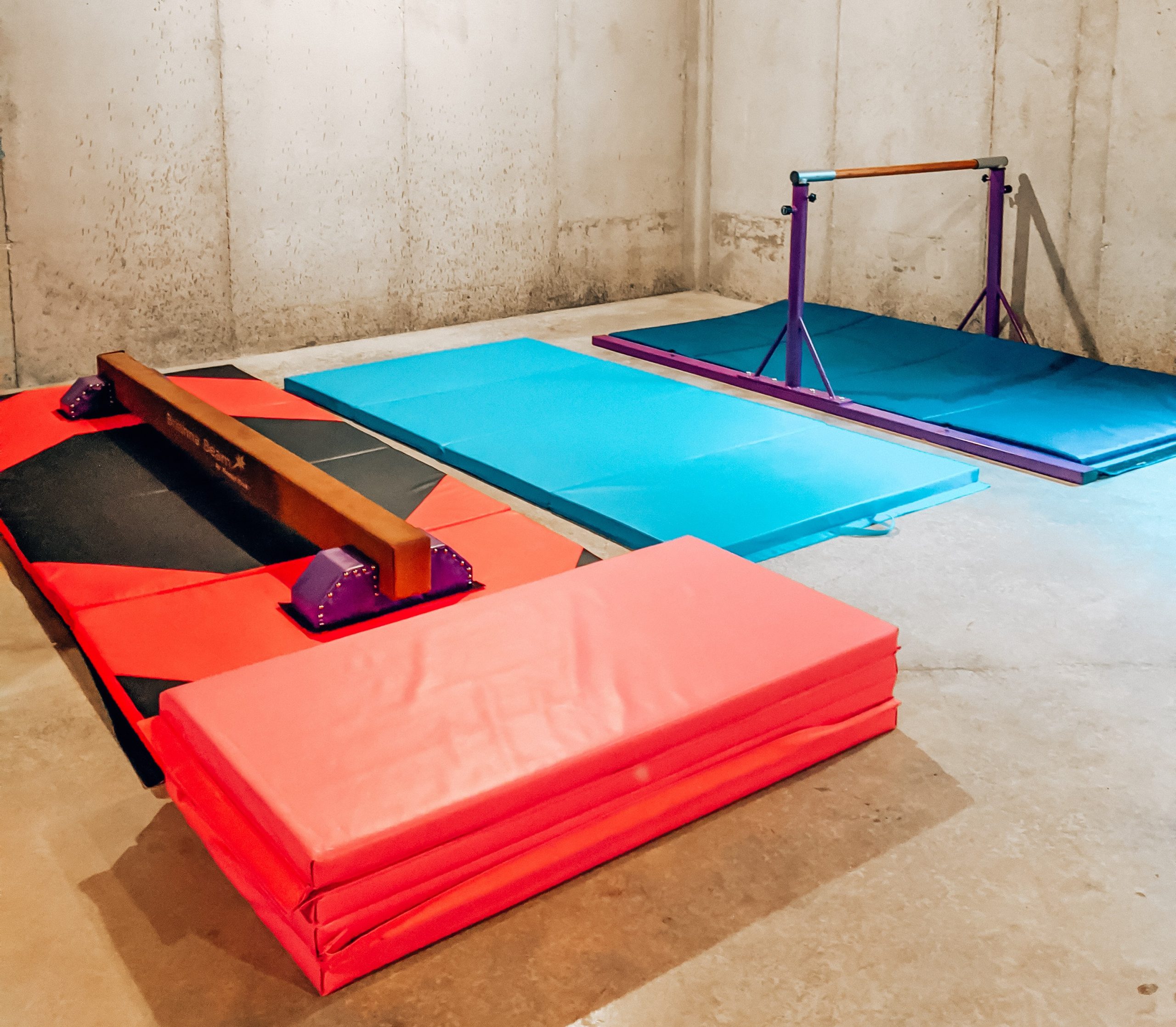 Best Gymnastics Equipment for Home - Home Gymnastics Setup - Home Gymnastics Equipment: Kansas City blogger Tricia Nibarger shows the best gymnastics equipment for home with her family's home gymnastics setup! #gymnastics #littlegymnast #gymnast 