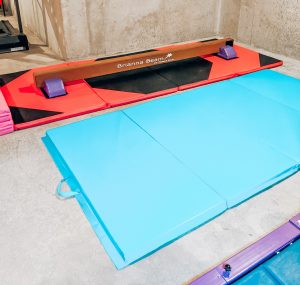 Best Gymnastics Equipment for Home - Home Gymnastics Setup - Home Gymnastics Equipment: Kansas City blogger Tricia Nibarger shows the best gymnastics equipment for home with her family's home gymnastics setup! #gymnastics #littlegymnast #gymnast