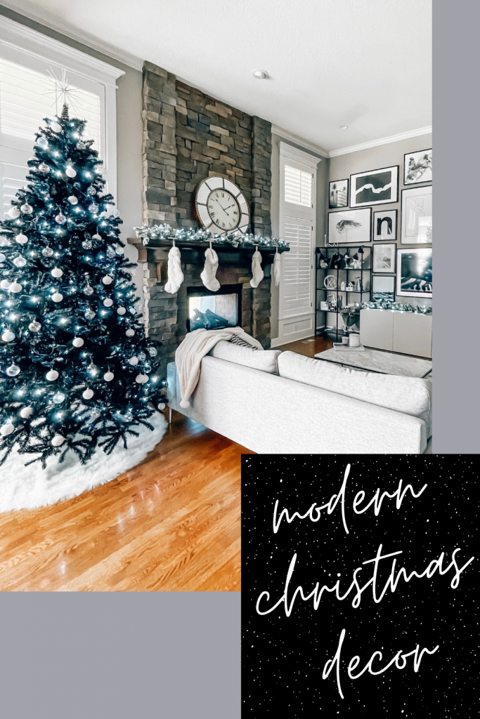 Modern Living Room Christmas Decor - Blogger Tricia Nibarger shares living room Christmas decor in her modern home, featuring a black Christmas tree and a monochrome Christmas theme! #modern #christmasdecor #blackchristmastree